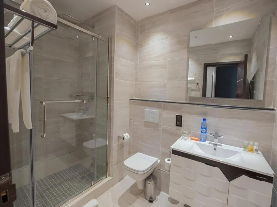 Bathroom in Tripod By Pedestal Hotel