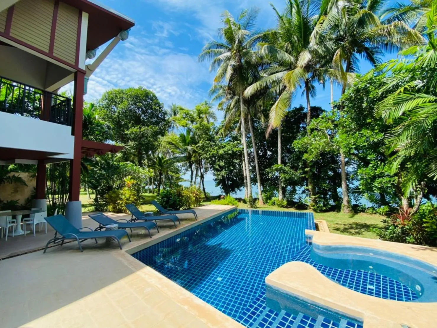Swimming pool in Amatapura Beachfront Villa 15, SHA Certified