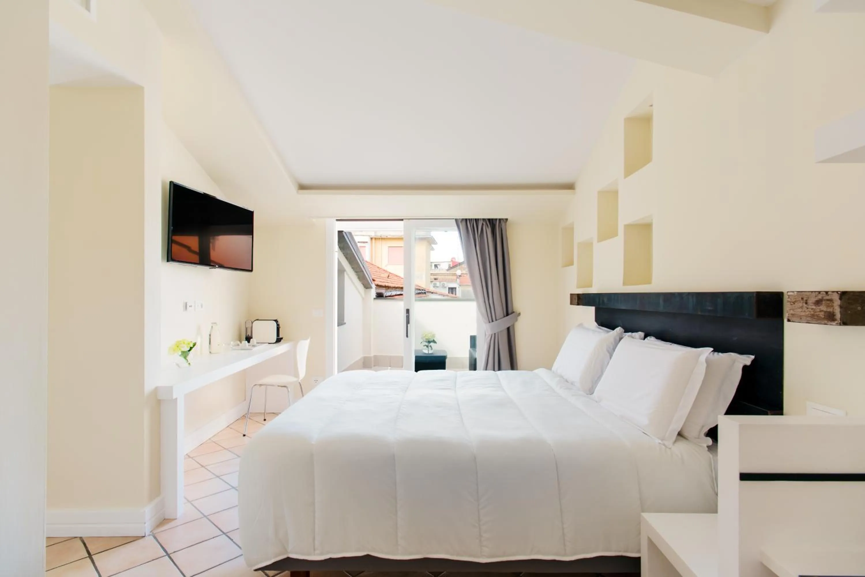 Bed in Palazzo Gargiulo Luxury Rooms & Suites