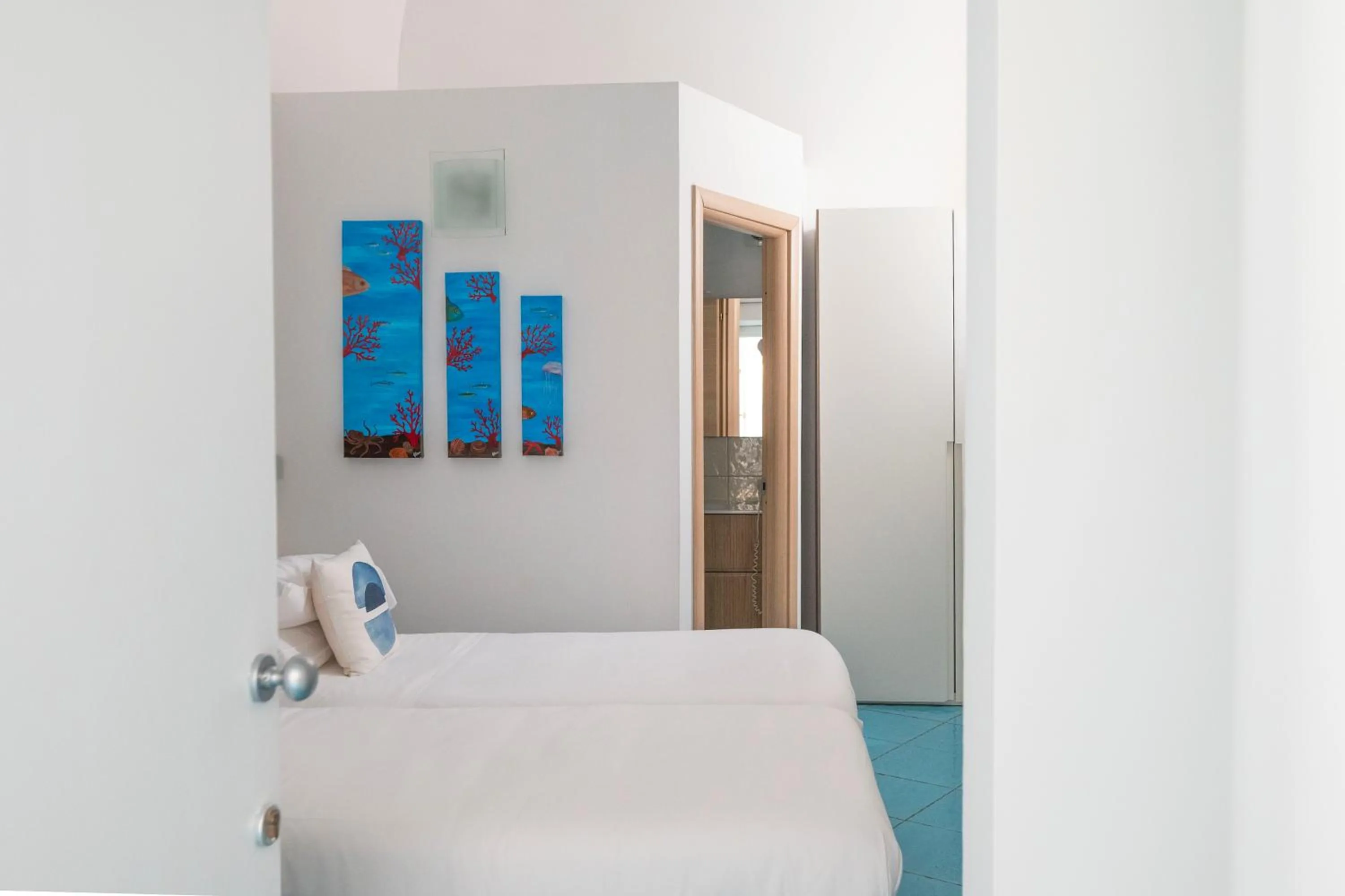 Bed in Palazzo Gargiulo Luxury Rooms & Suites