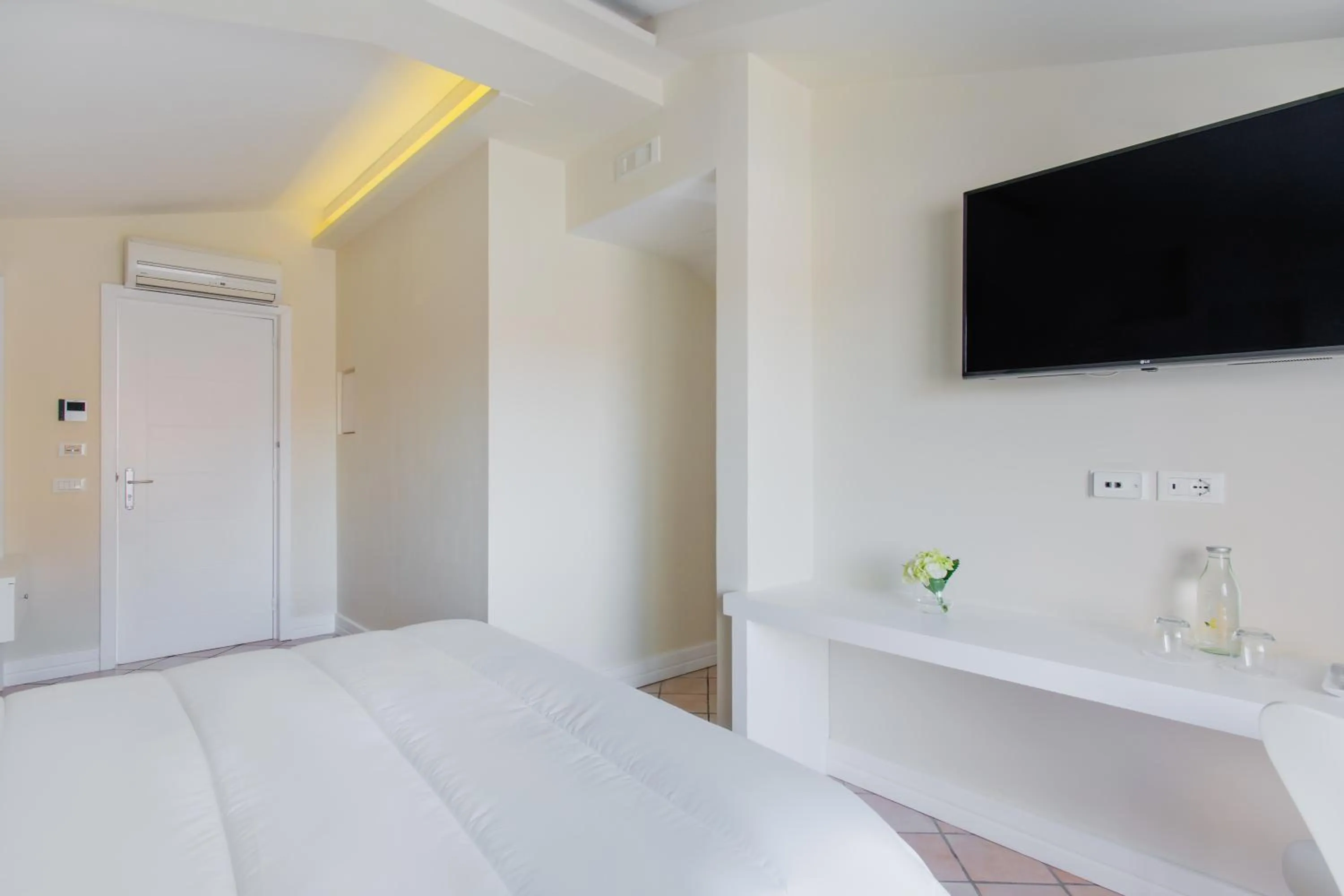 Bed in Palazzo Gargiulo Luxury Rooms & Suites