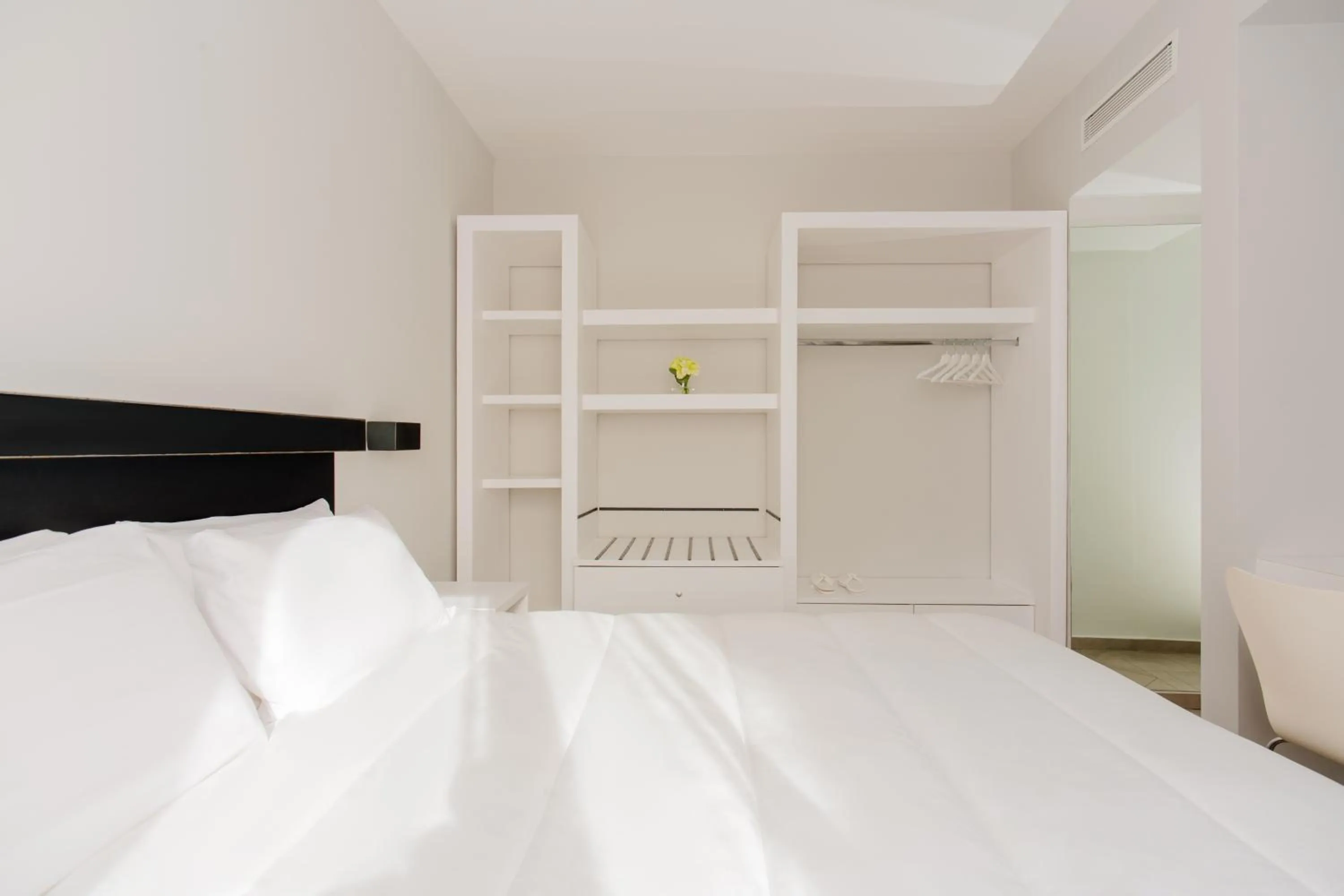 Bed in Palazzo Gargiulo Luxury Rooms & Suites