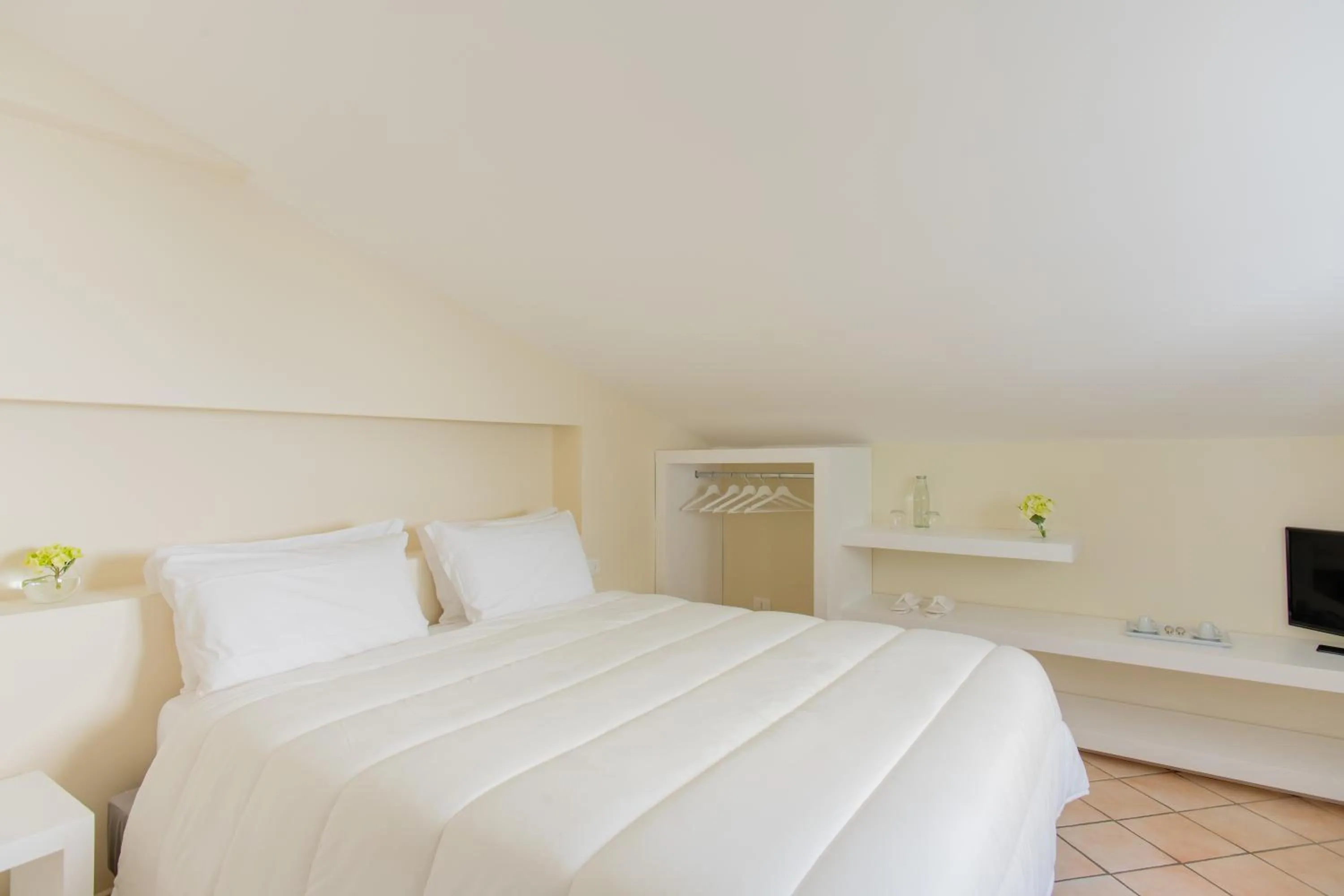 Bed in Palazzo Gargiulo Luxury Rooms & Suites