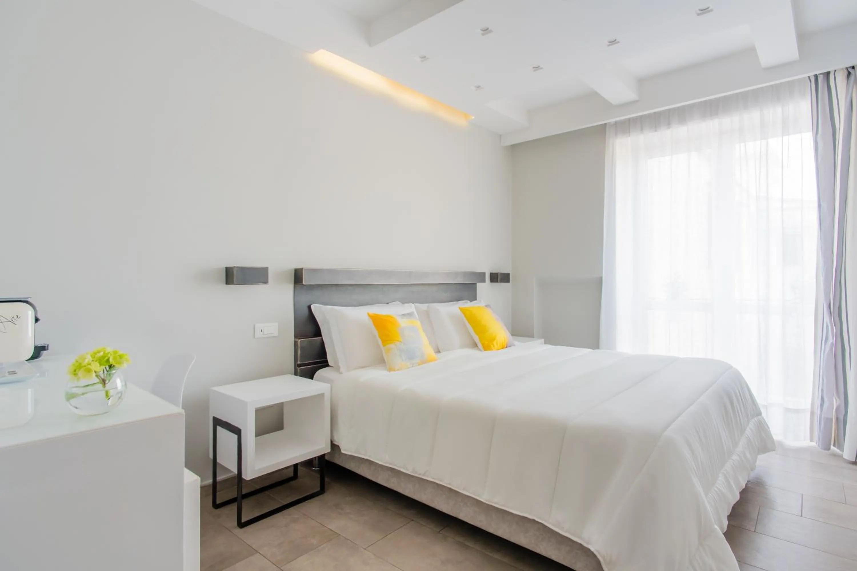 Bed in Palazzo Gargiulo Luxury Rooms & Suites