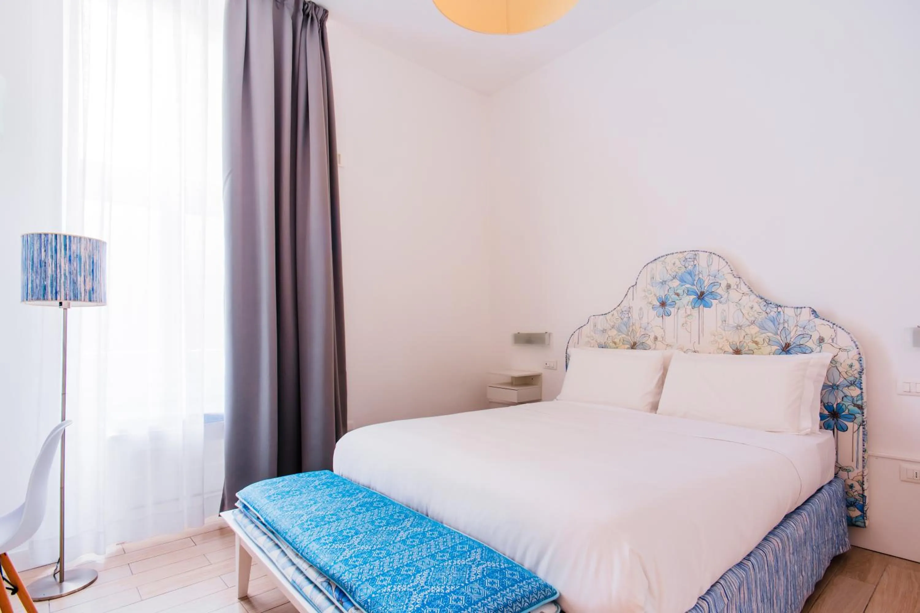 Bed in Palazzo Gargiulo Luxury Rooms & Suites