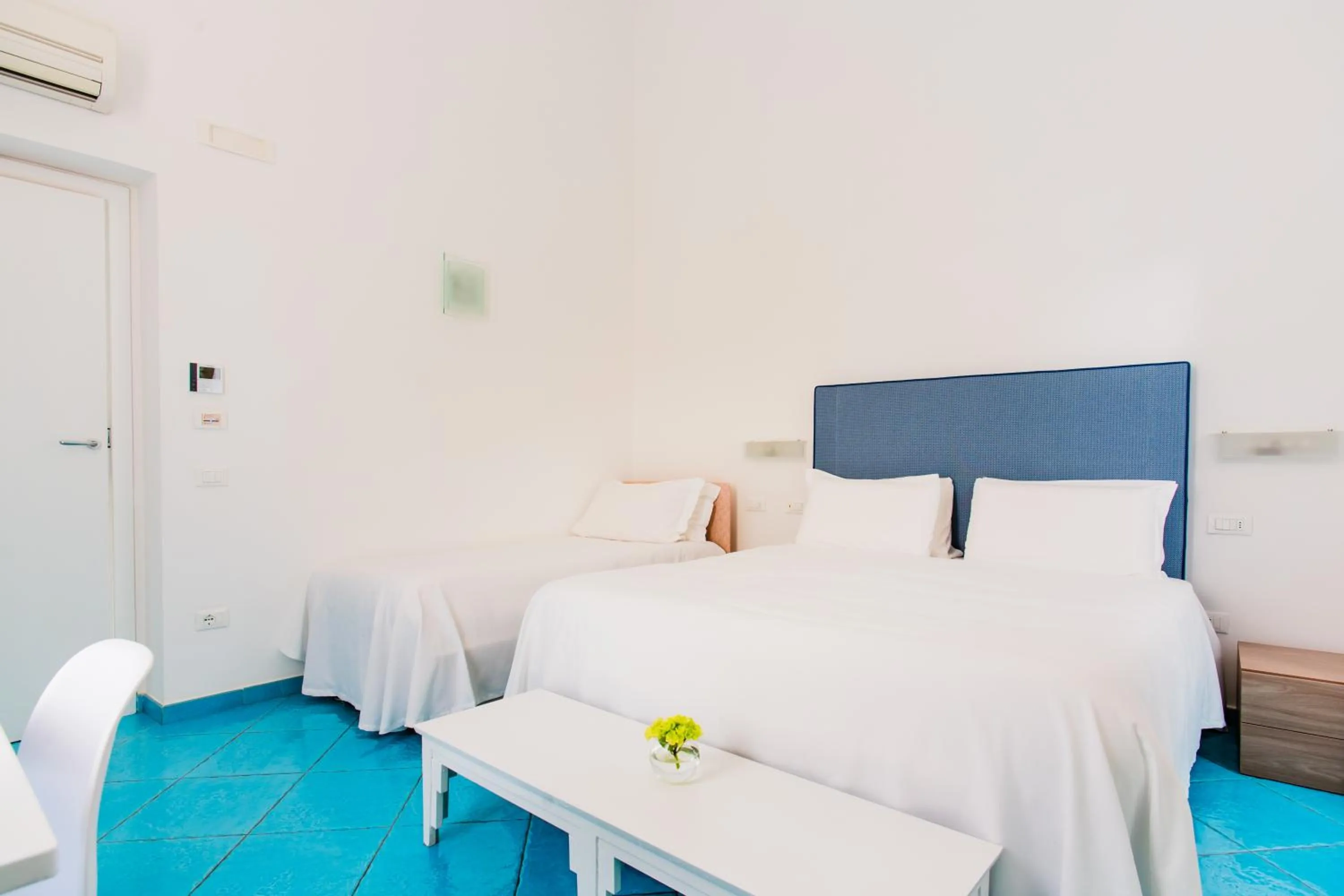 Bed in Palazzo Gargiulo Luxury Rooms & Suites