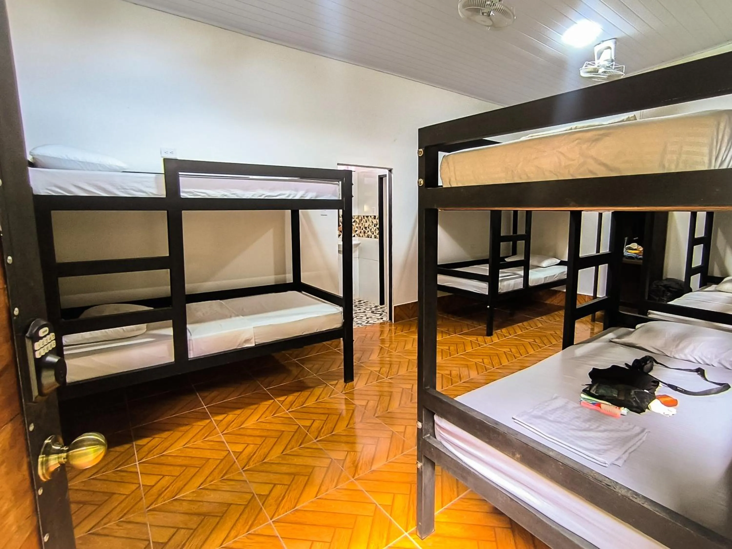 Bed in 8-Bed Mixed Dormitory Room in Hostel Casa de las Palmas Tours