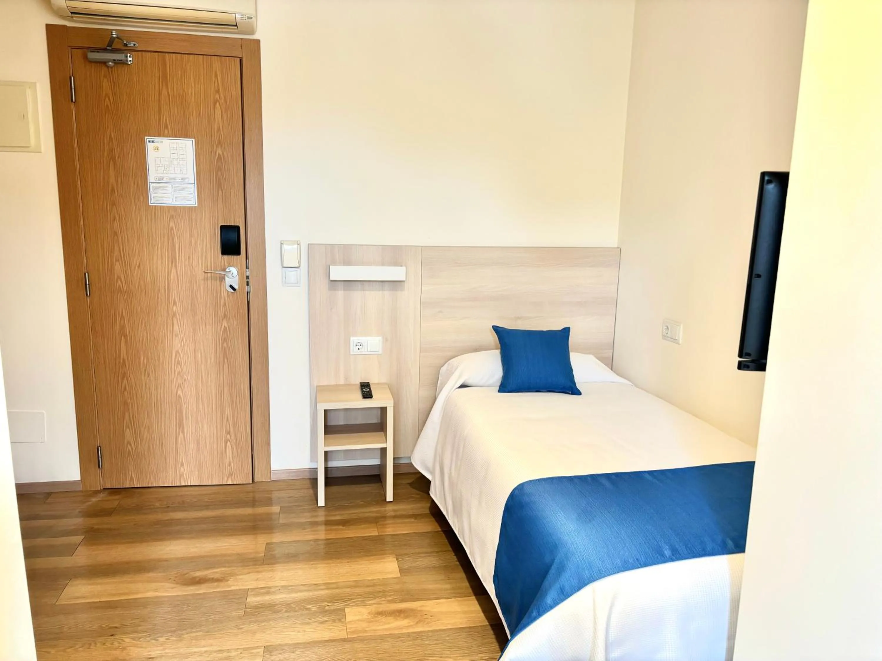 Bed in Bluewater Hotel