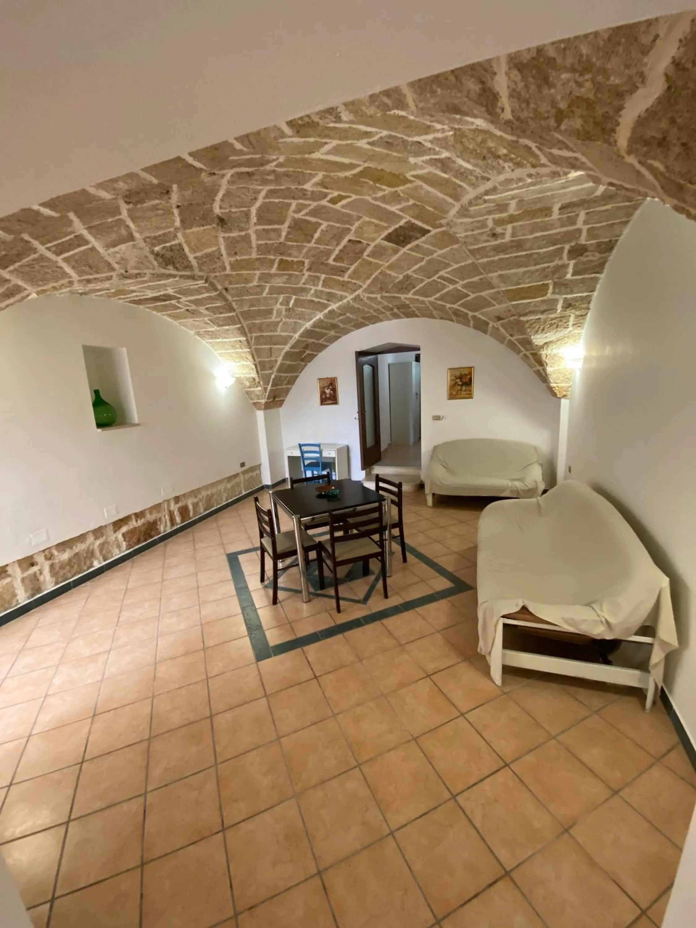 Communal lounge/ TV room in Ugento Dimora