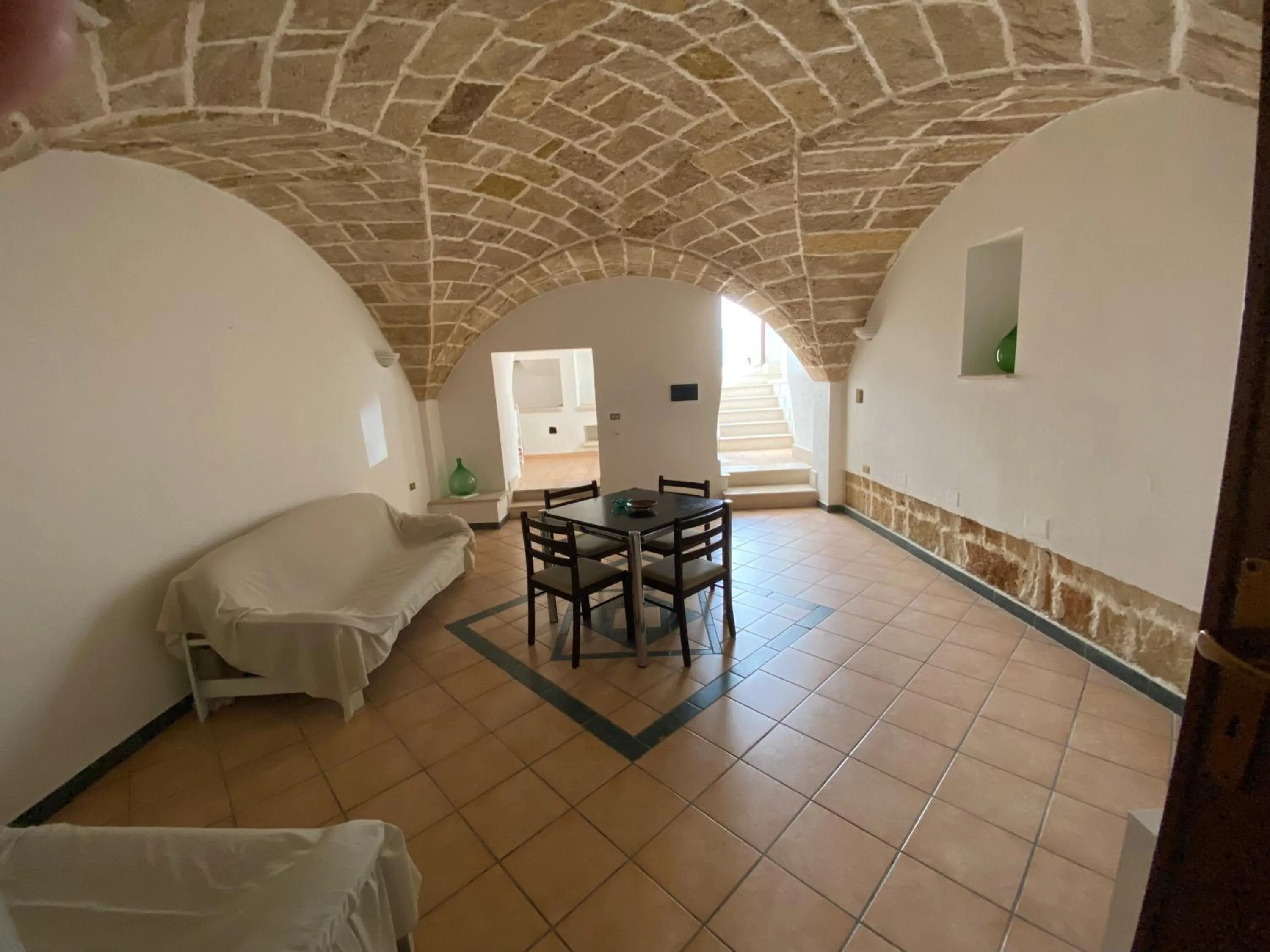 Communal lounge/ TV room in Ugento Dimora