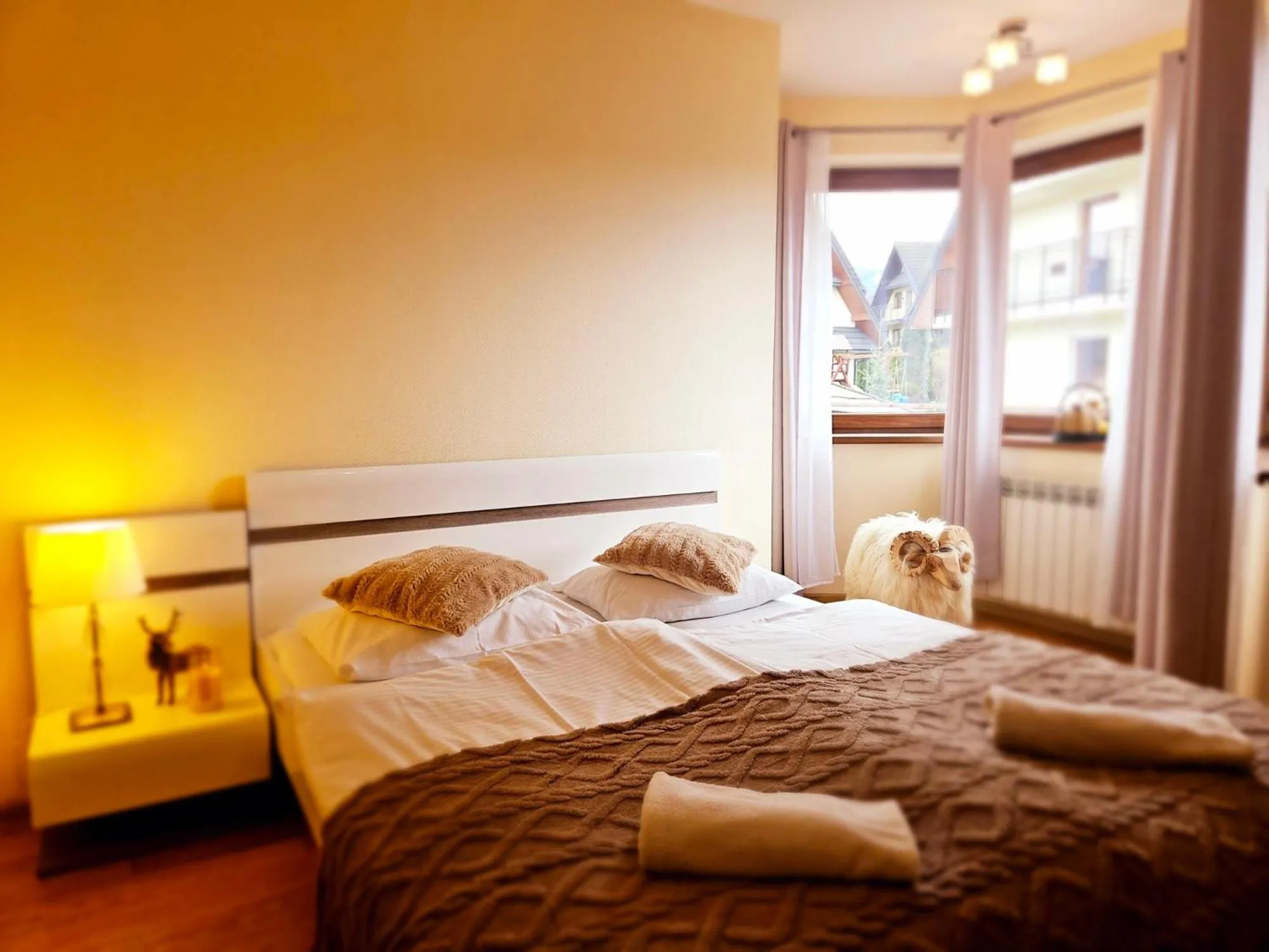 Bed in Willa Regina II Resort & SPA