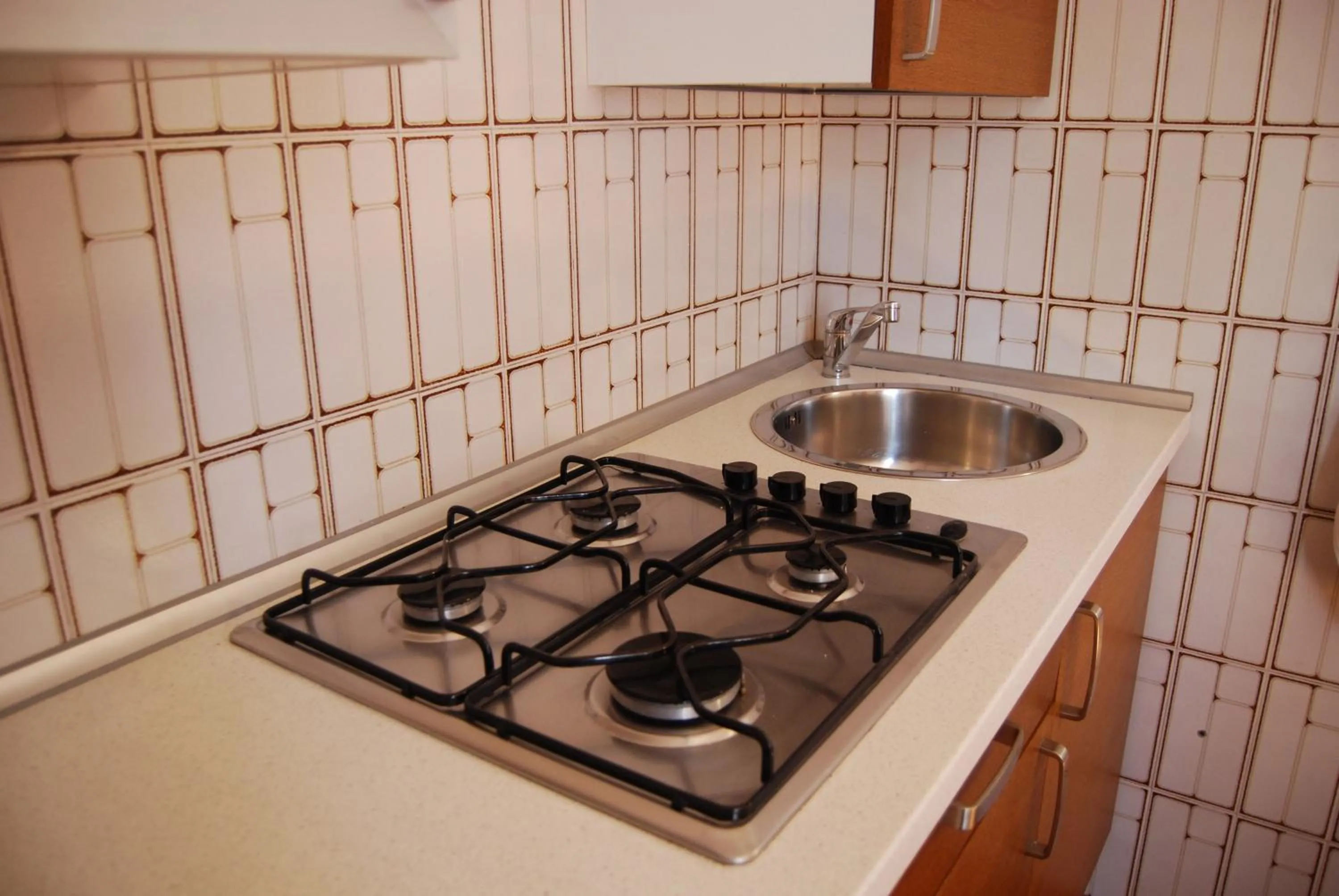 Kitchen or kitchenette in Appartamenti Corneliani