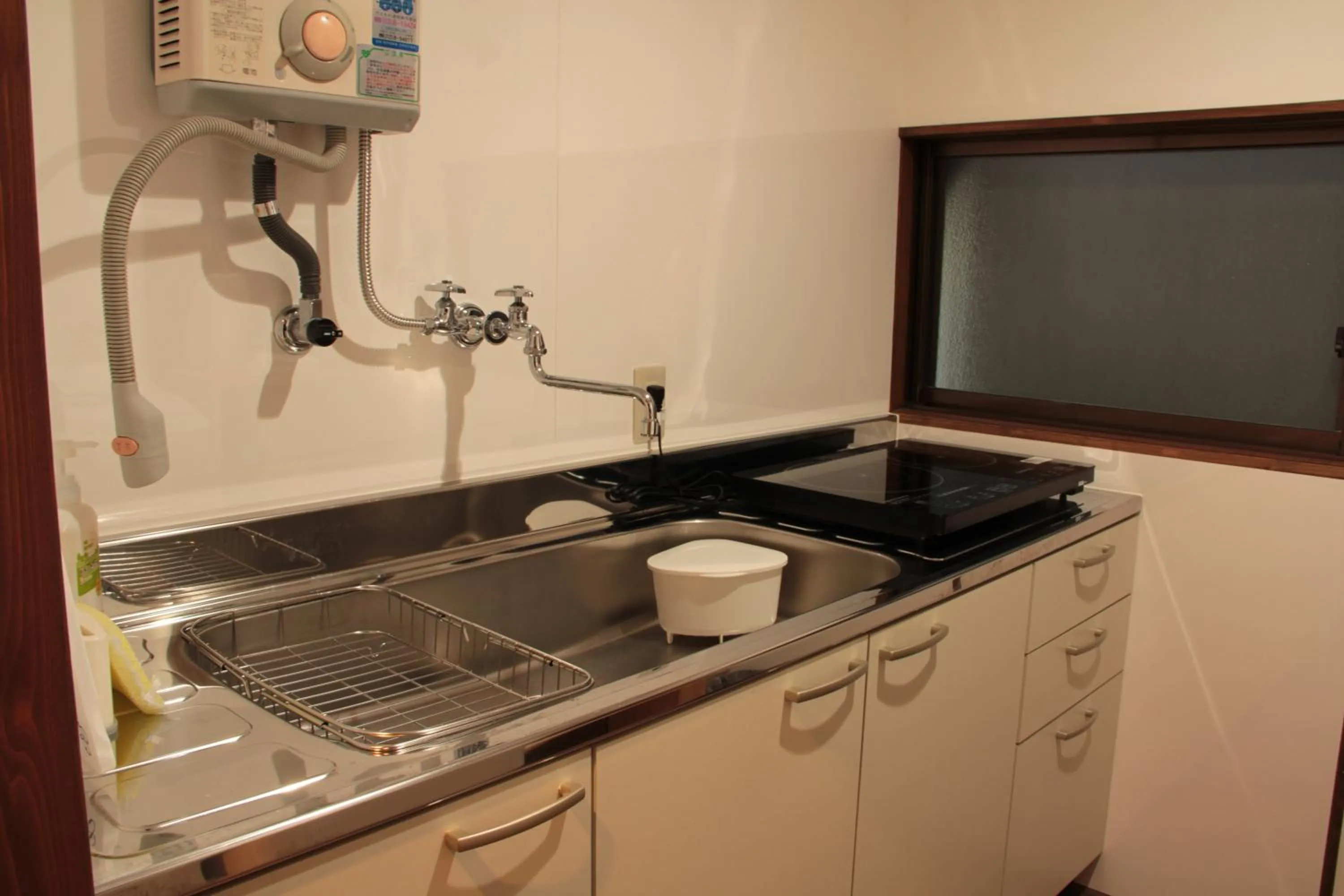 Kitchen or kitchenette in Our turn Machiya inn