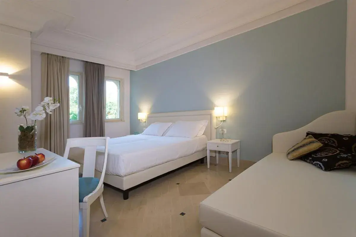 Bedroom, Bed in Hellenia Yachting Hotel & SPA Bedroom, Bed in Hellenia Yachting Hotel & SPA