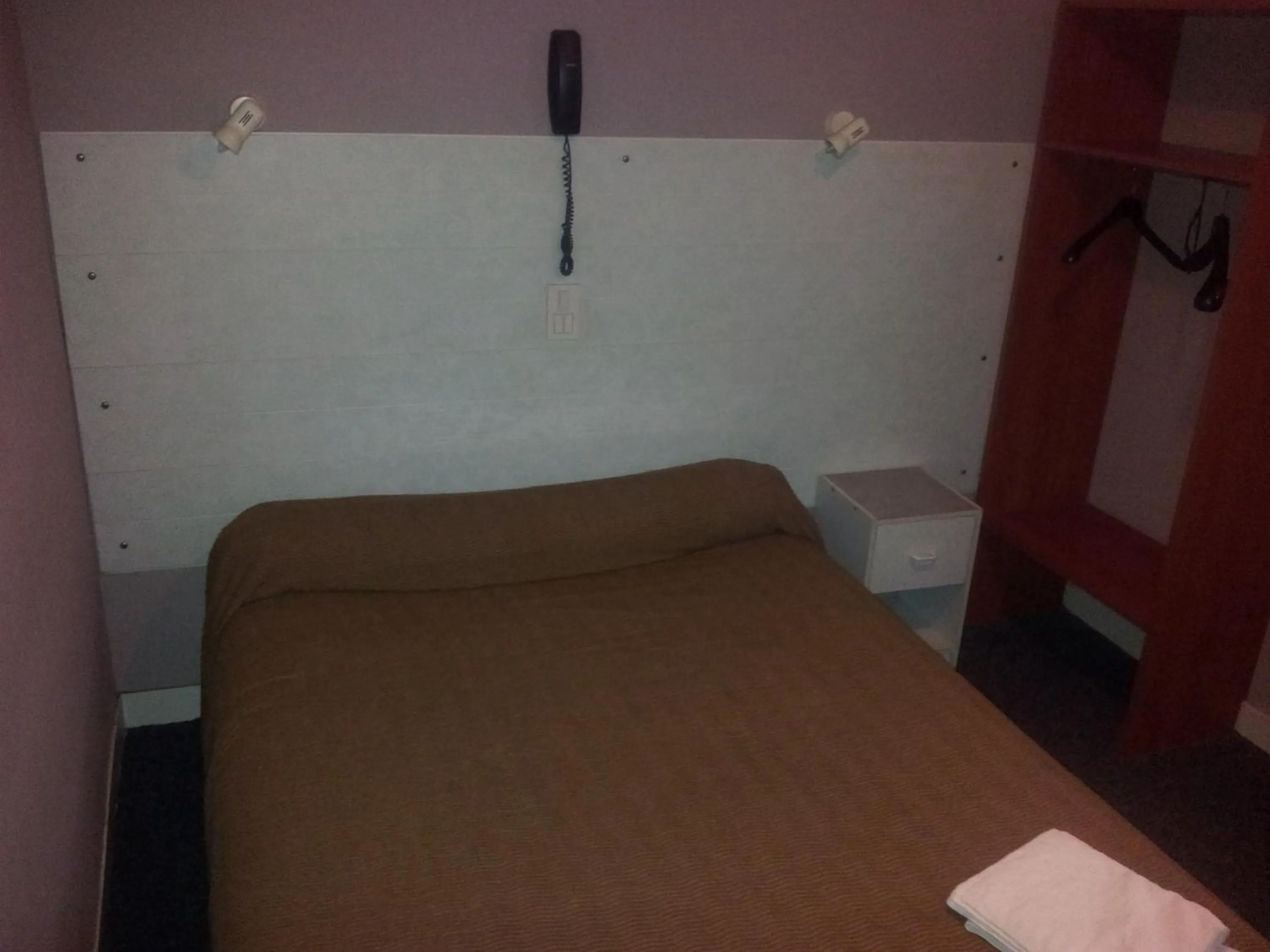 Bedroom in Hôtel du Terrage