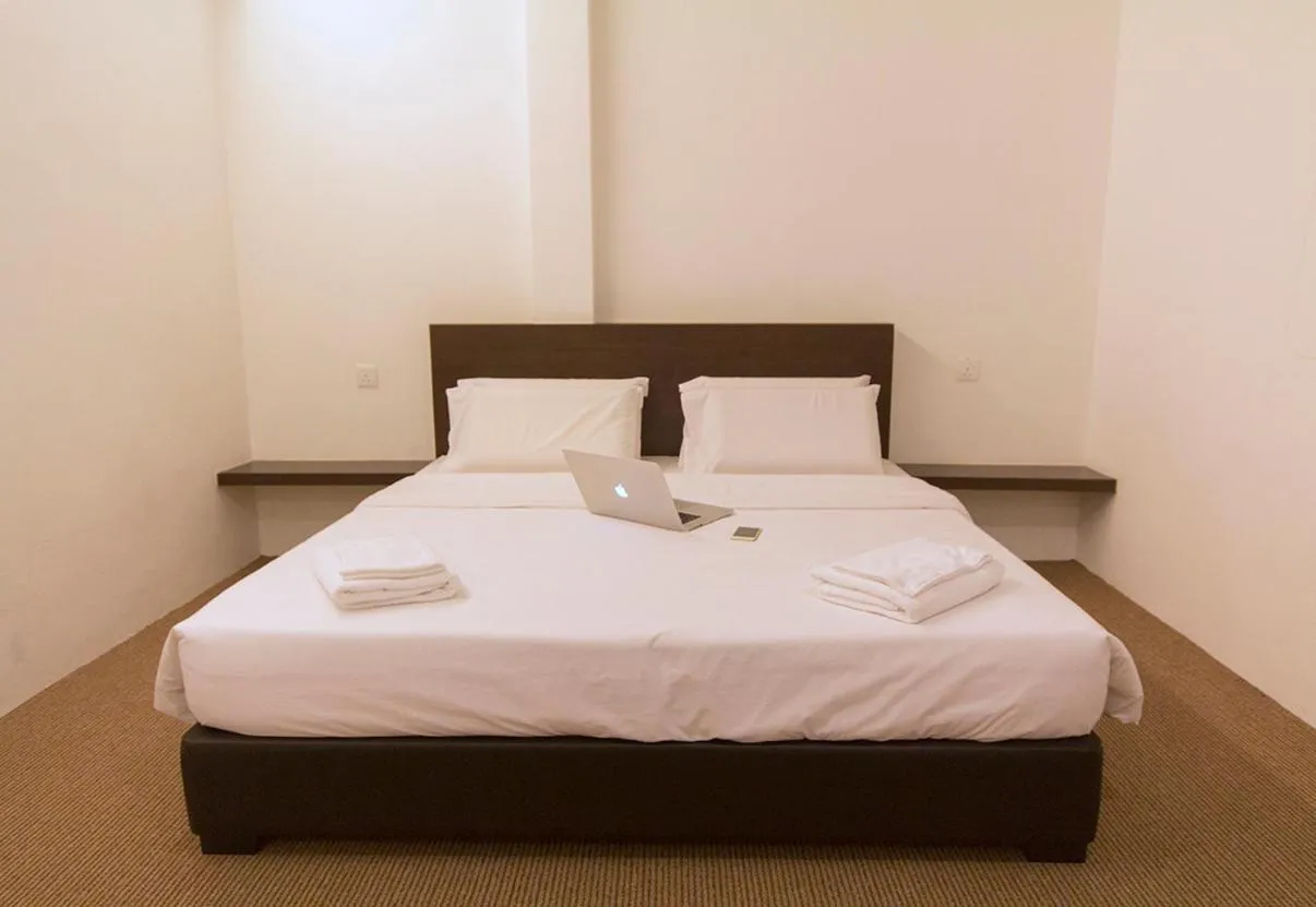 Photo of the whole room, Bed in HOTEL RAUB since 1968