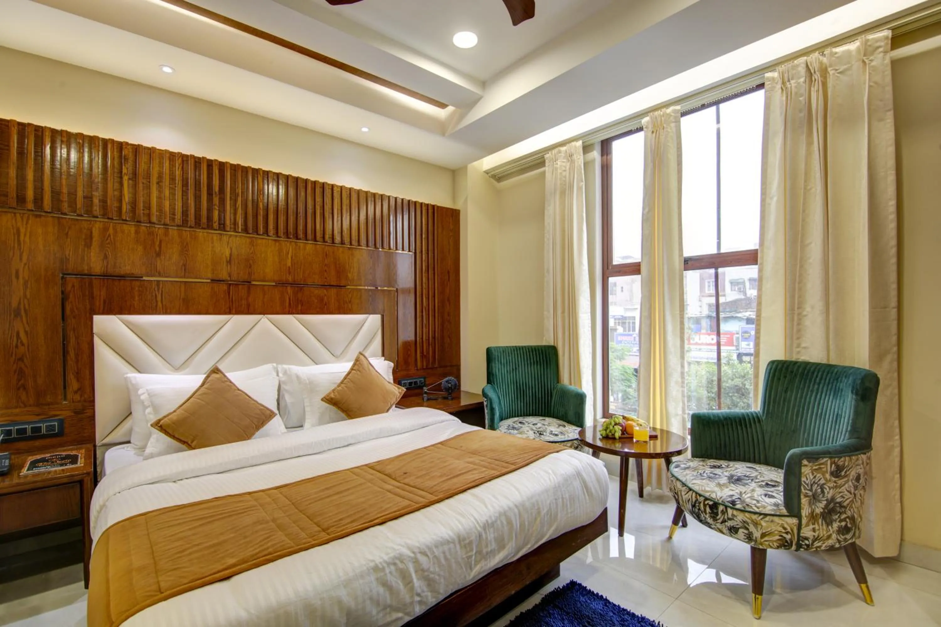 Photo of the whole room, Bed in The Leena International-Near Connaught Place & New Delhi Railway Station
