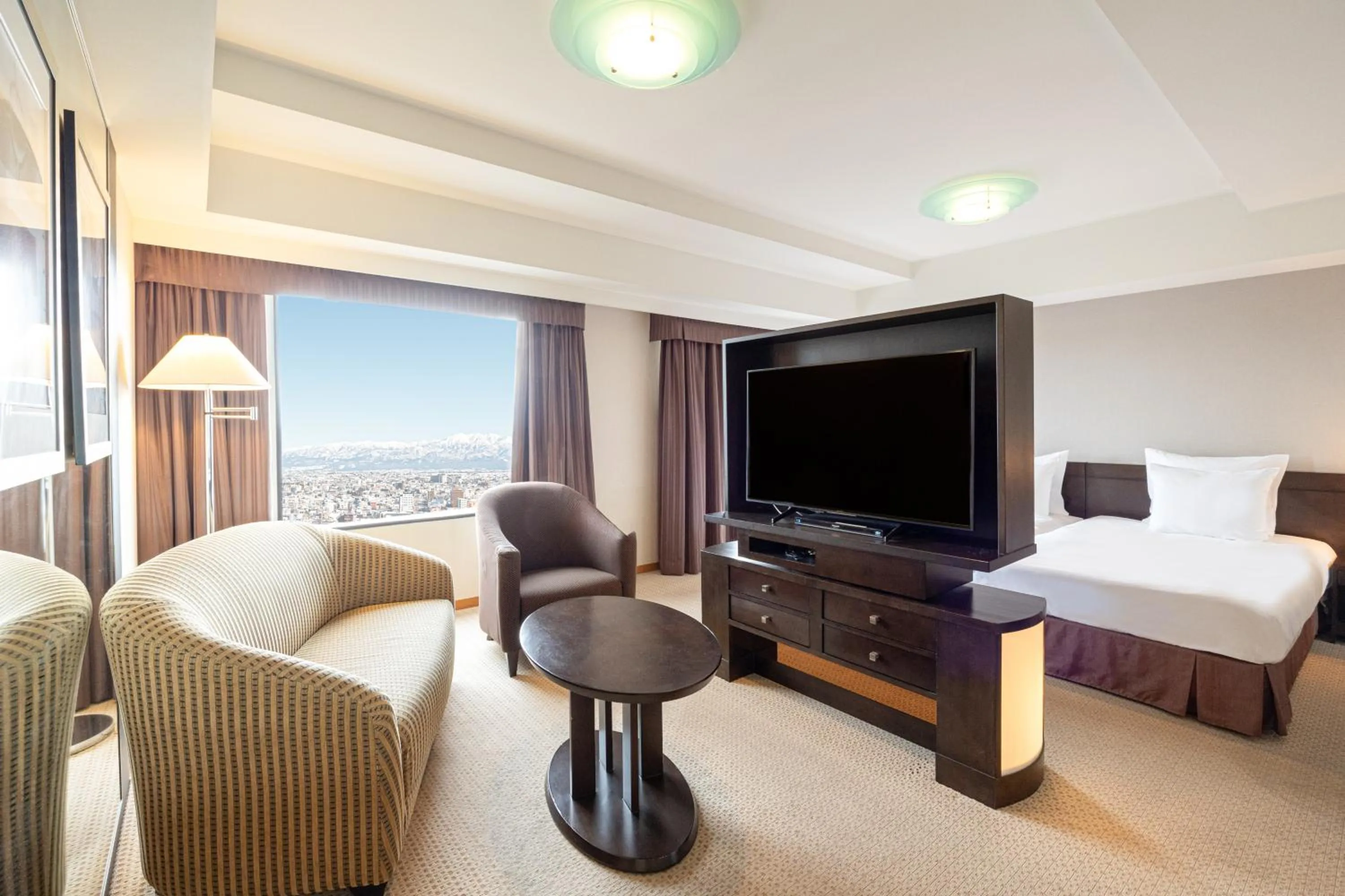 Photo of the whole room, Bed in ANA Crowne Plaza Toyama by IHG