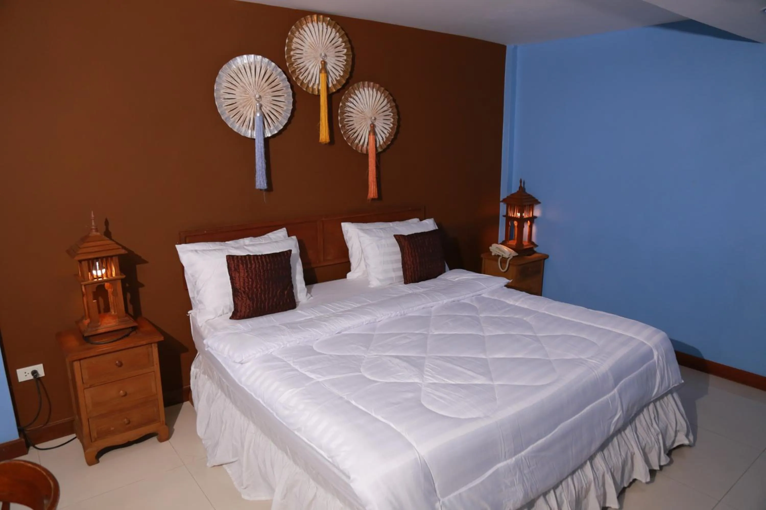 Bed in UPAR Hotels Silom