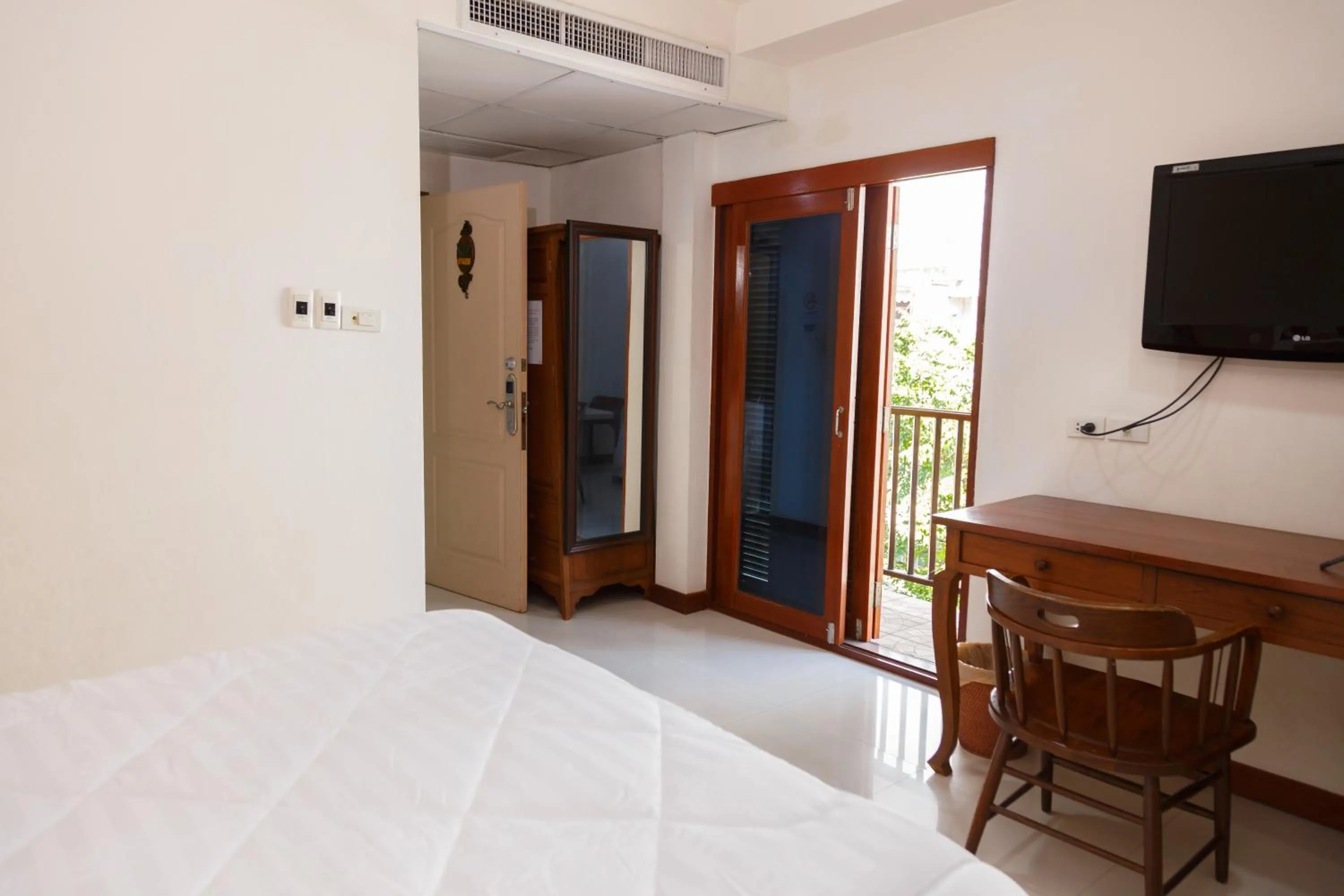 Bed in UPAR Hotels Silom