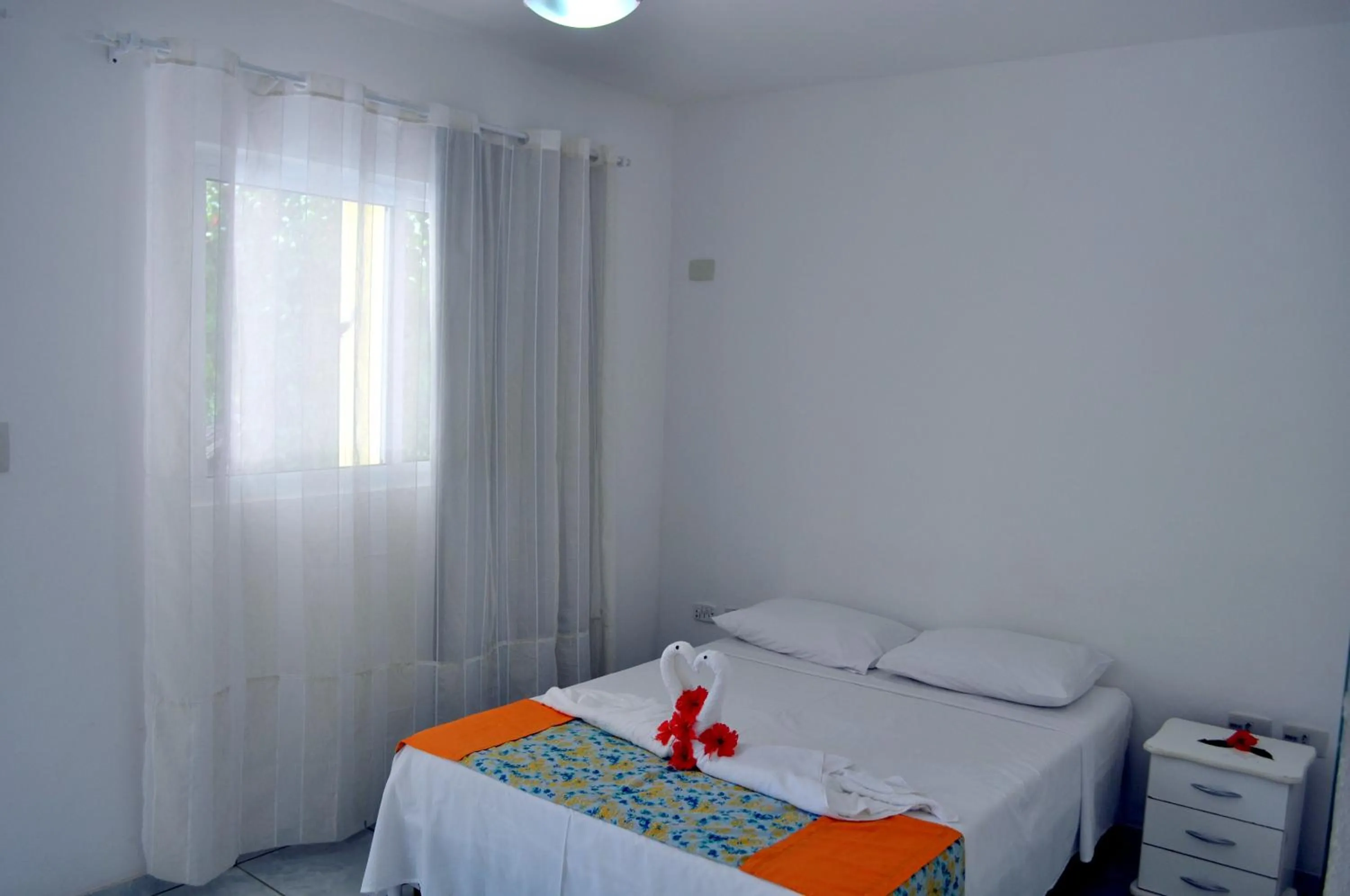 Bed in Pousada Joia Rara