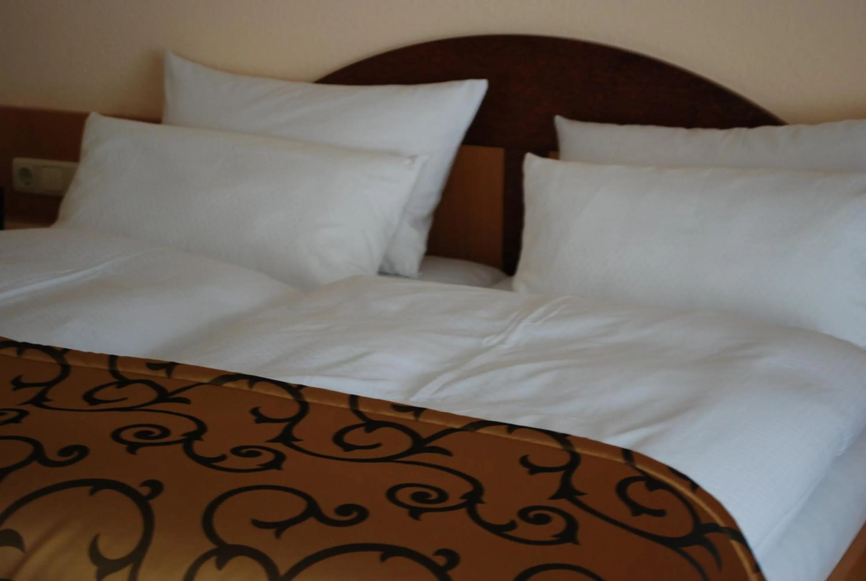 Decorative detail, Bed in Im Winkel Appartements und Zimmer