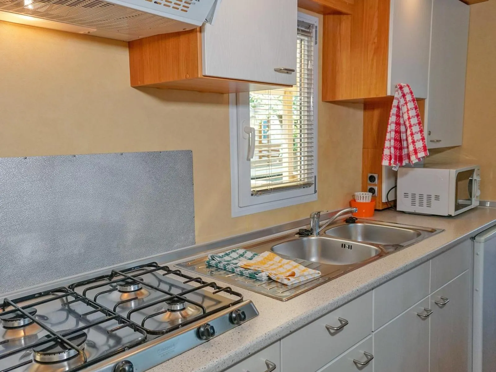 Kitchen or kitchenette in Portofelice Camping Village