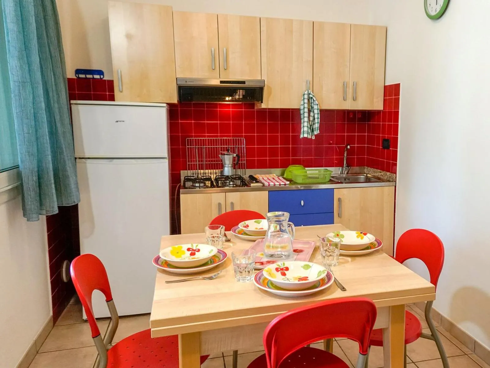 Communal lounge/ TV room in Portofelice Camping Village