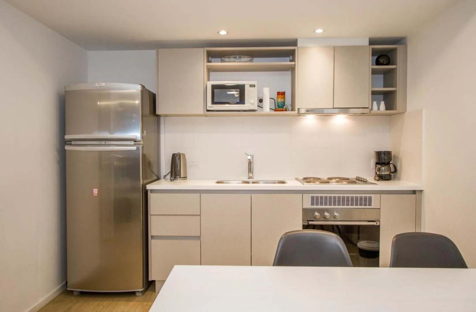 Kitchen or kitchenette in Pacifico Apartamentos