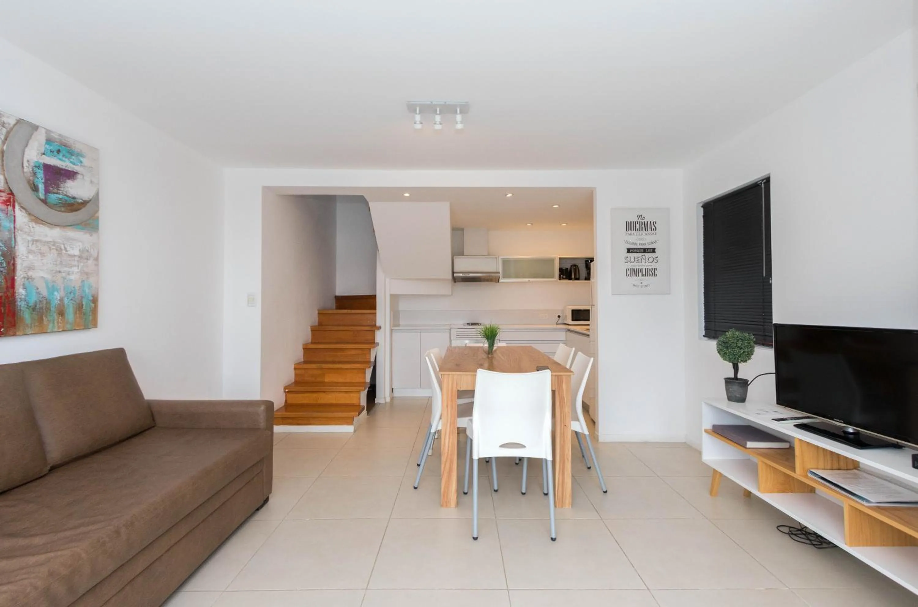 Communal lounge/ TV room in Pacifico Apartamentos