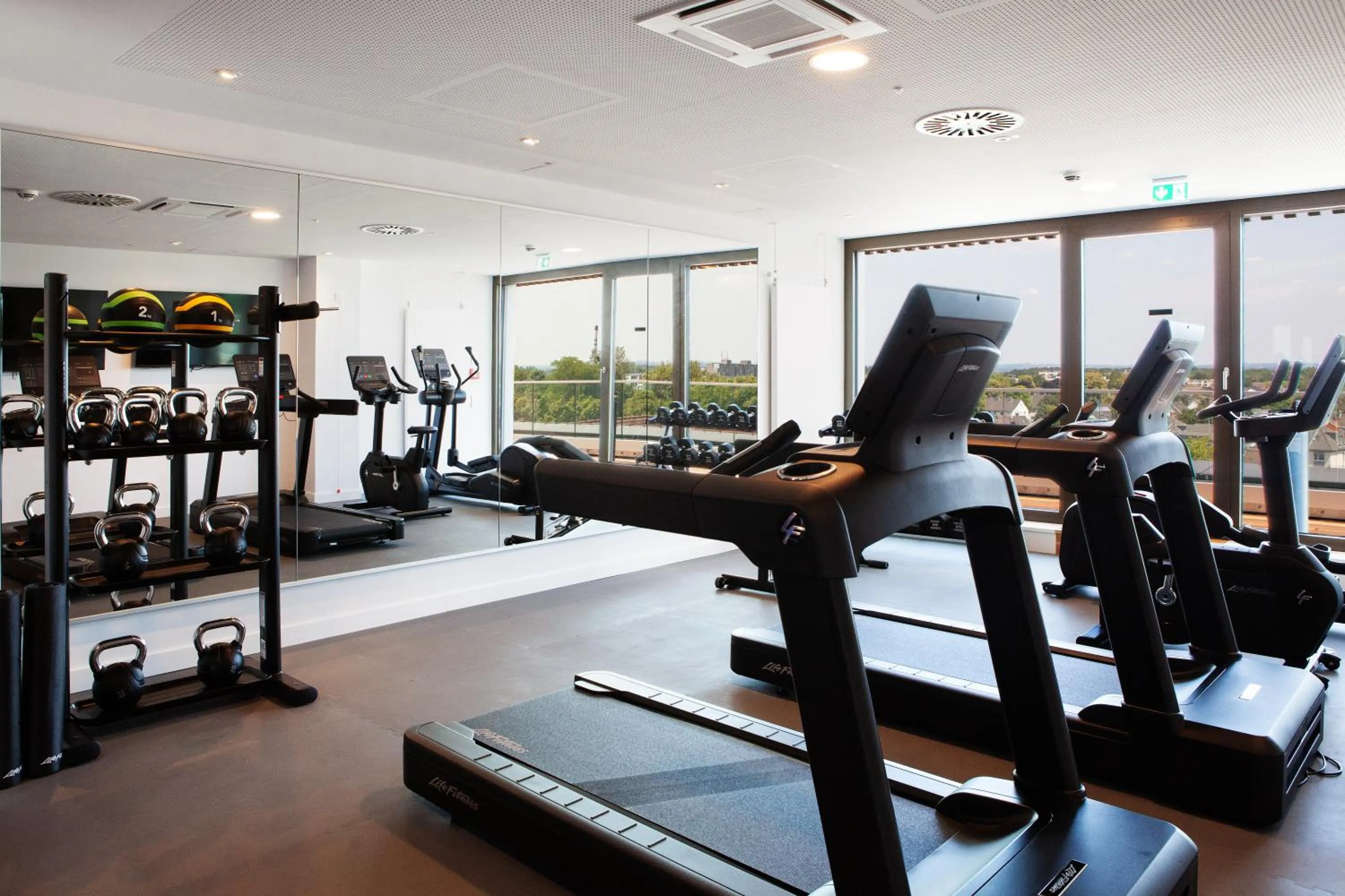 Fitness centre/facilities in Holiday Inn Express & Suites Monheim am Rhein by IHG