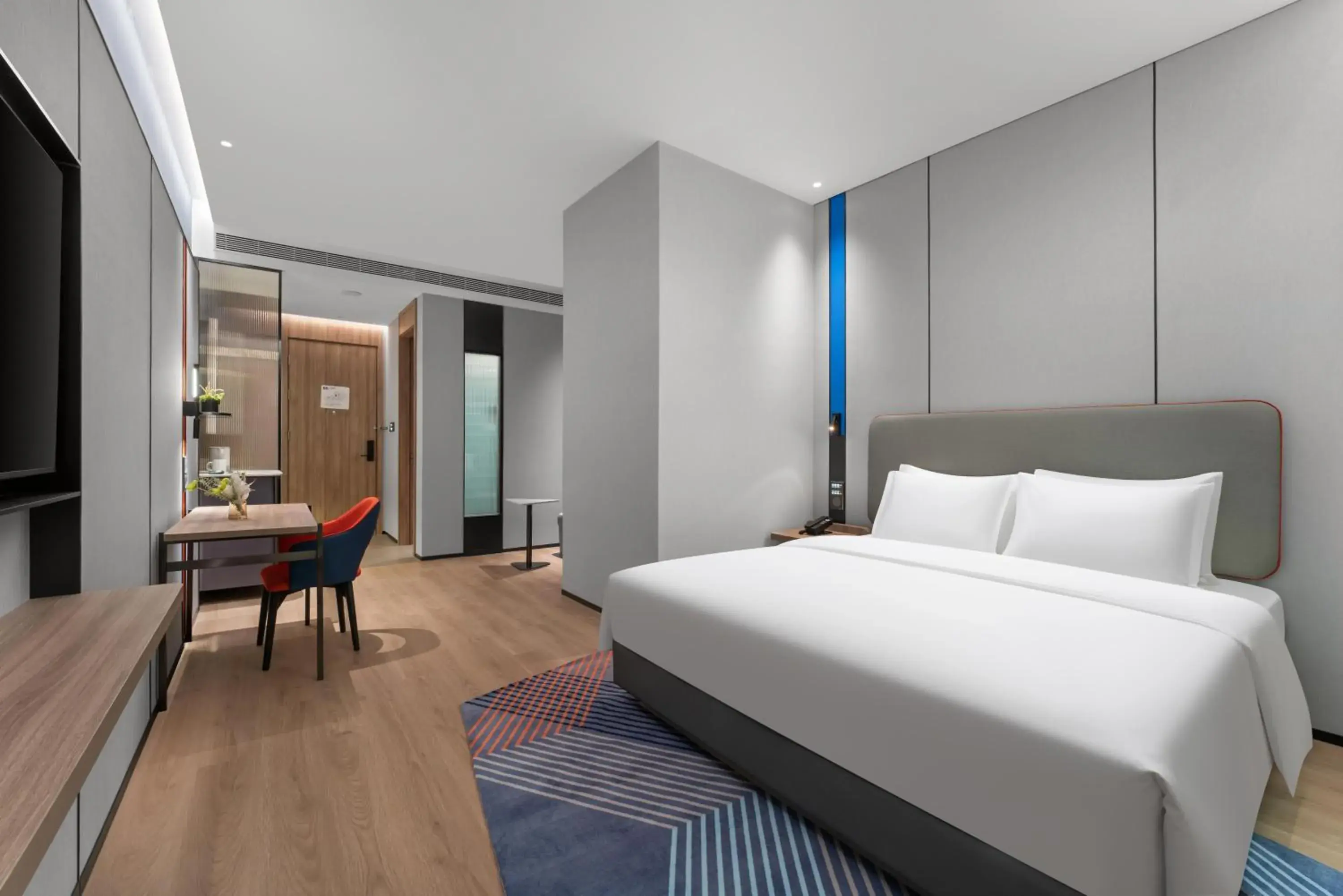 Bed in Holiday Inn Express Harbin Central Avenue by IHG Bed in Holiday Inn Express Harbin Central Avenue by IHG