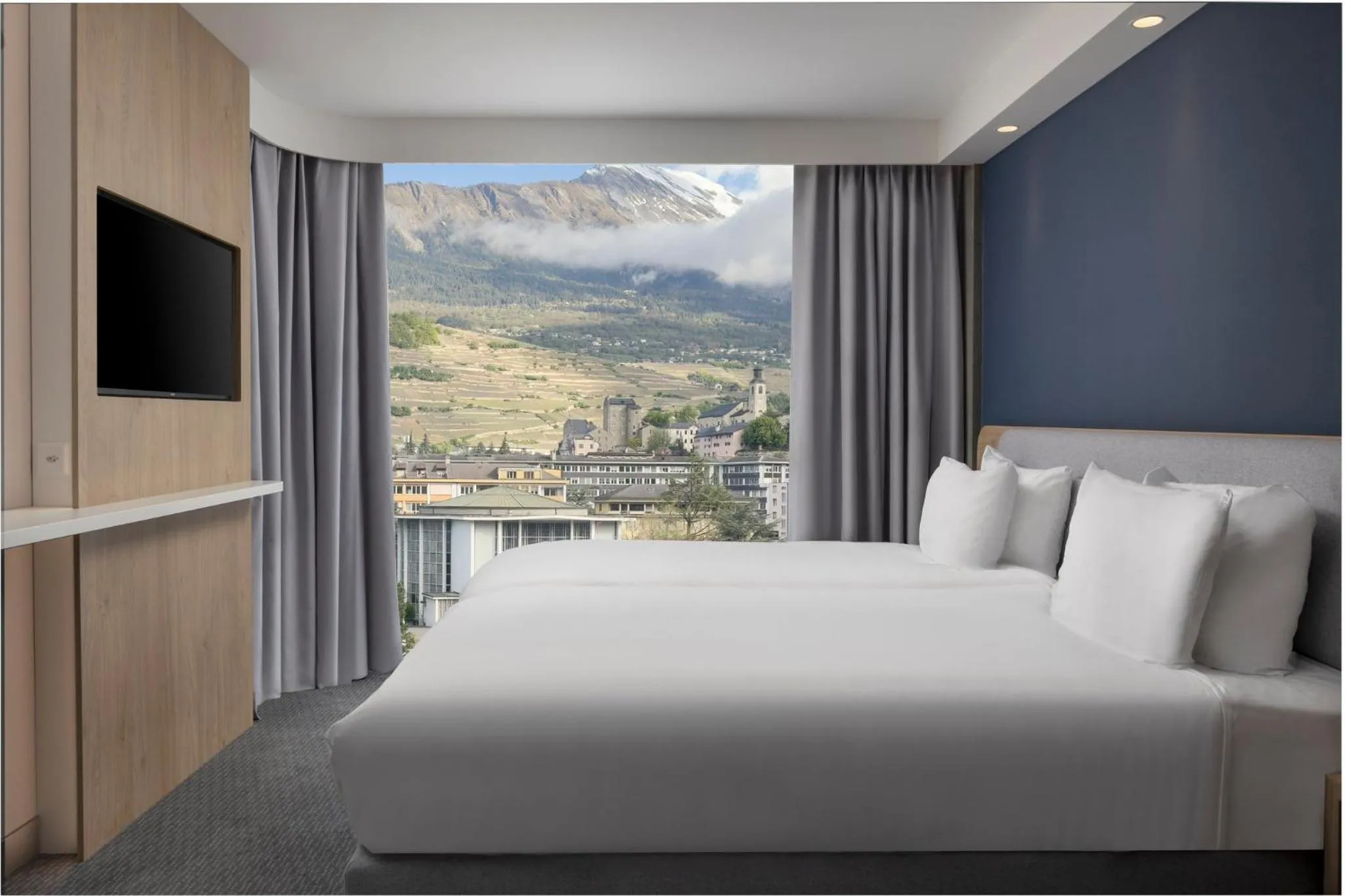 Photo of the whole room, Bed in Holiday Inn Express & Suites Sion by IHG