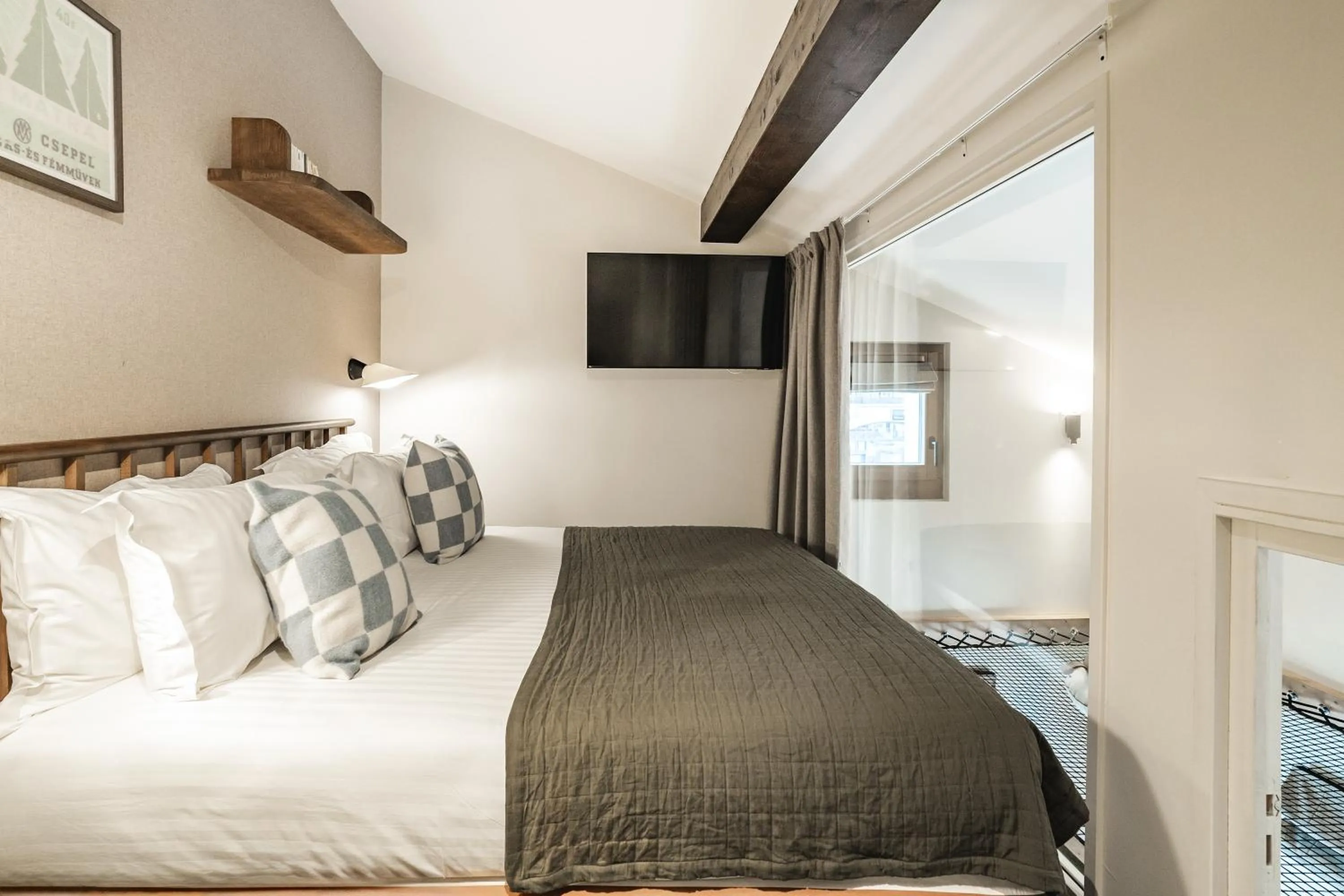 Bed in Appartements de l'Héliopic