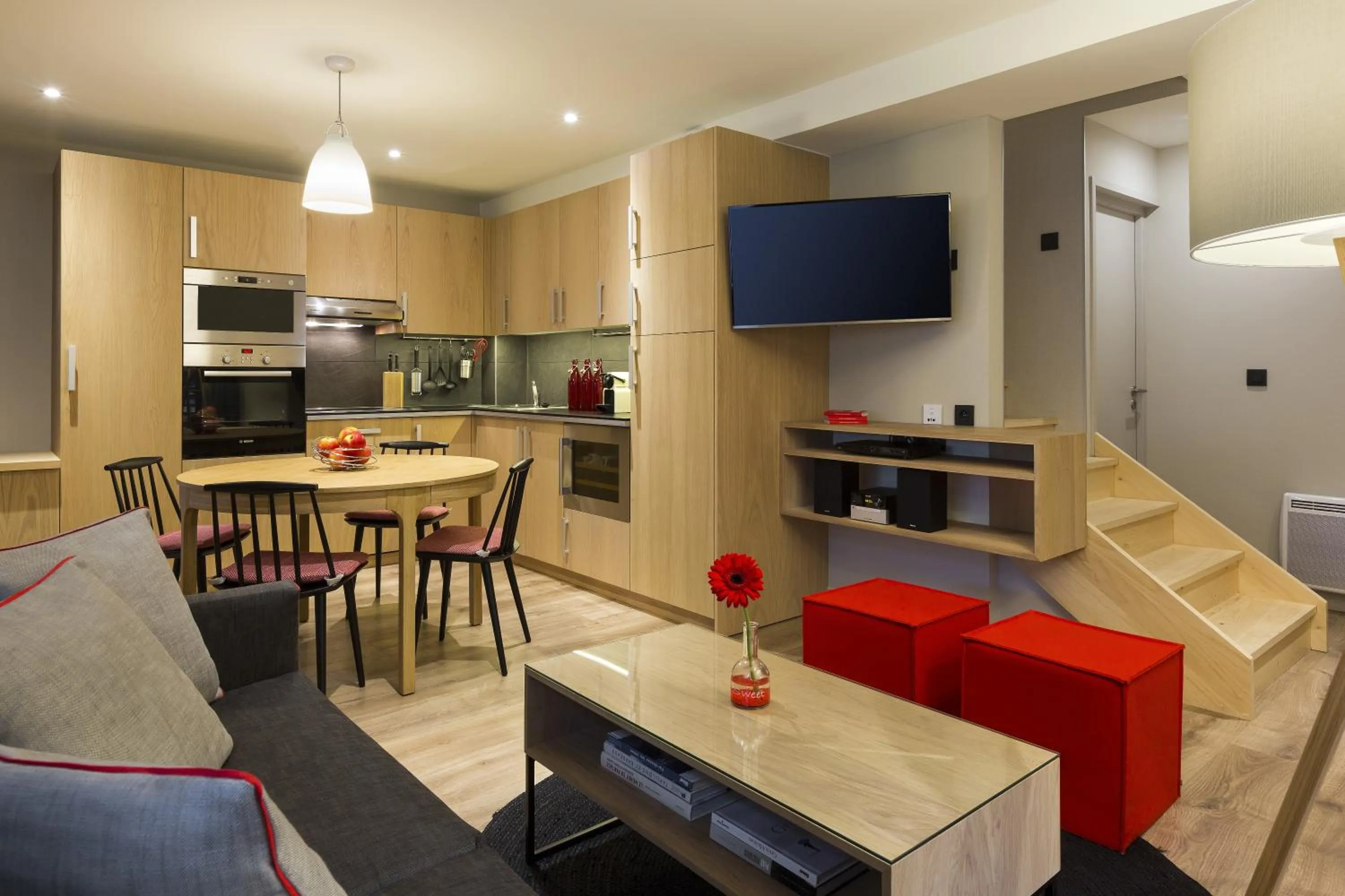 Communal lounge/ TV room in Appartements de l'Héliopic