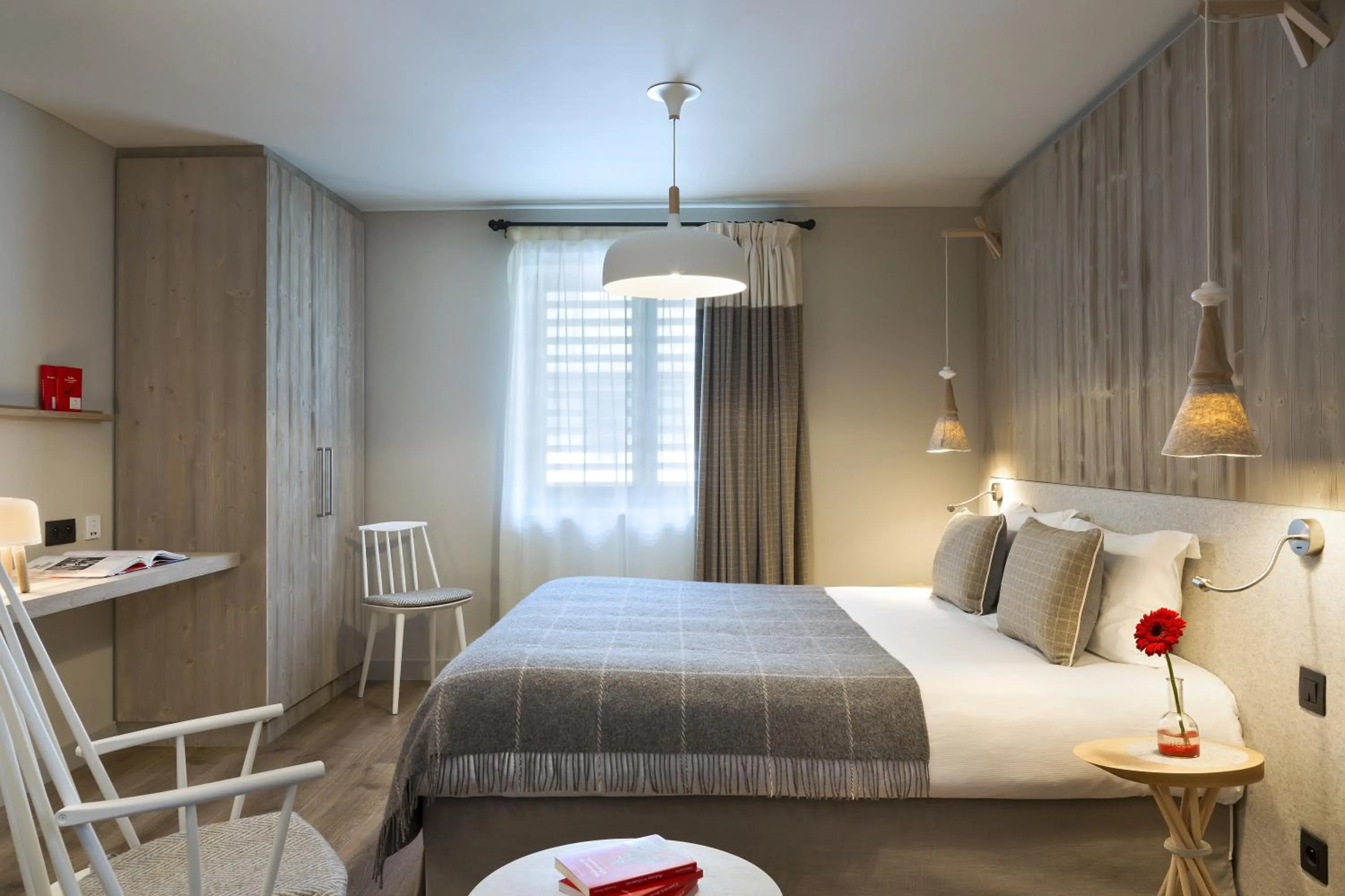 Bed in Appartements de l'Héliopic