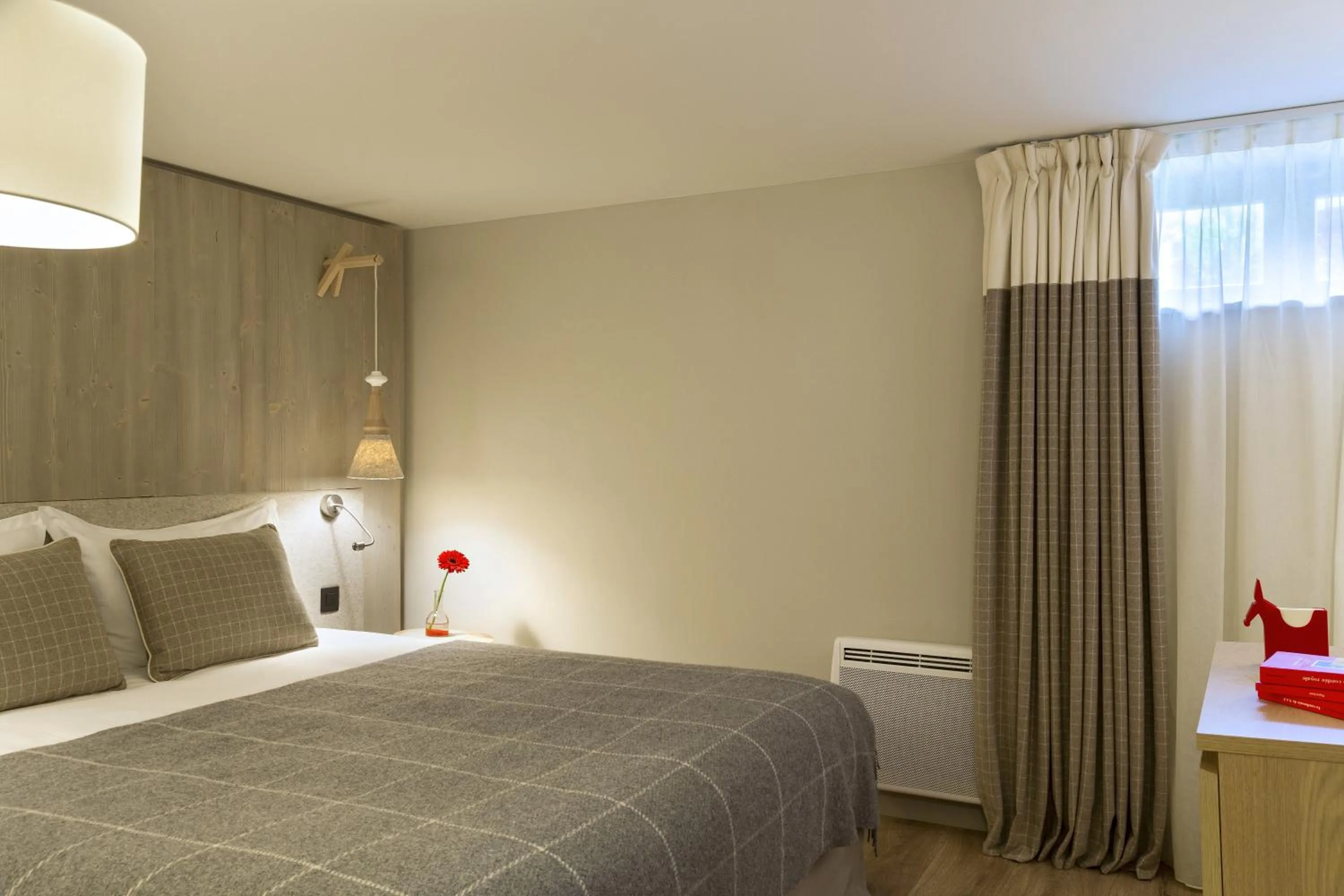 Bed in Appartements de l'Héliopic