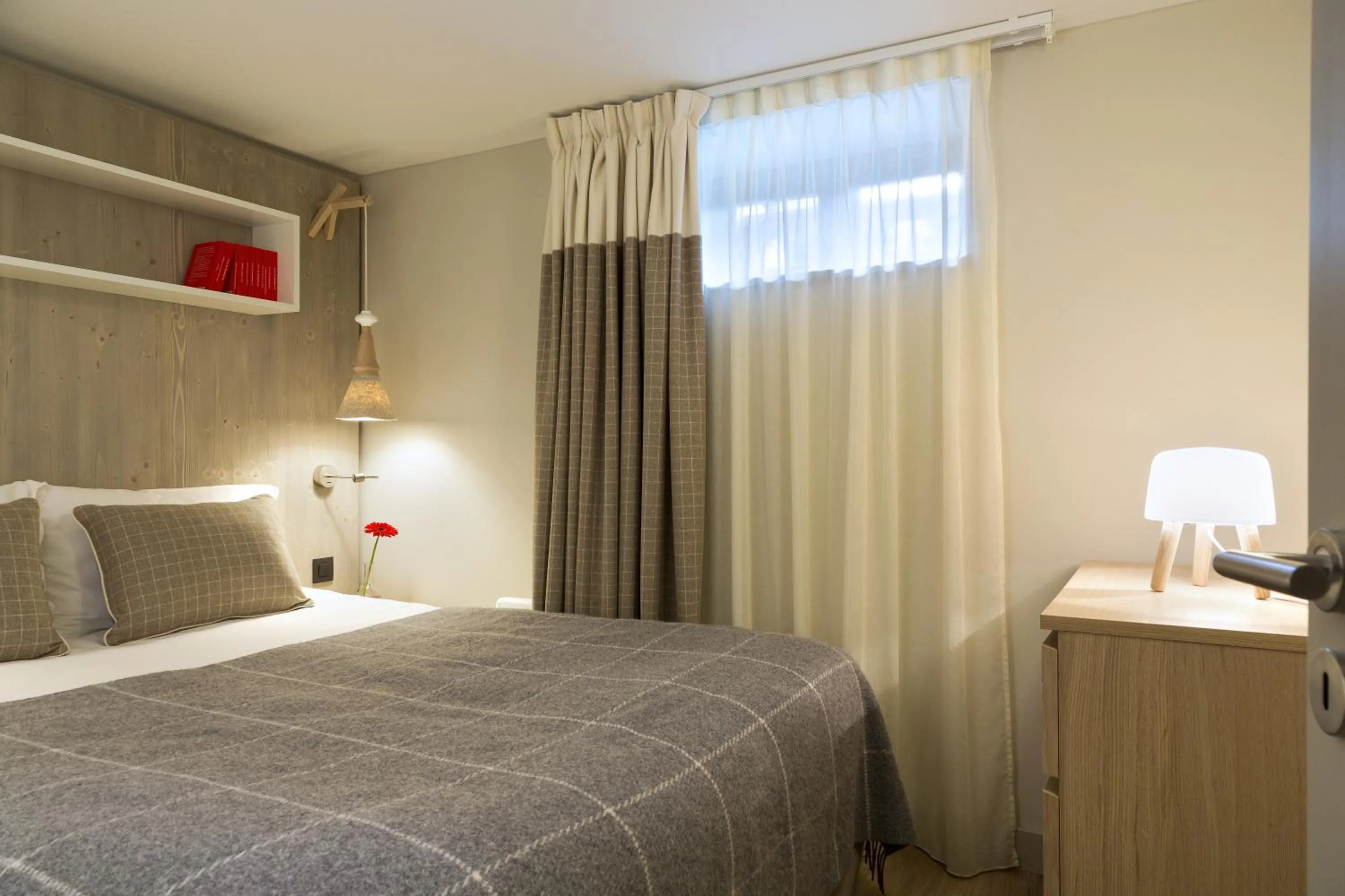 Bed in Appartements de l'Héliopic