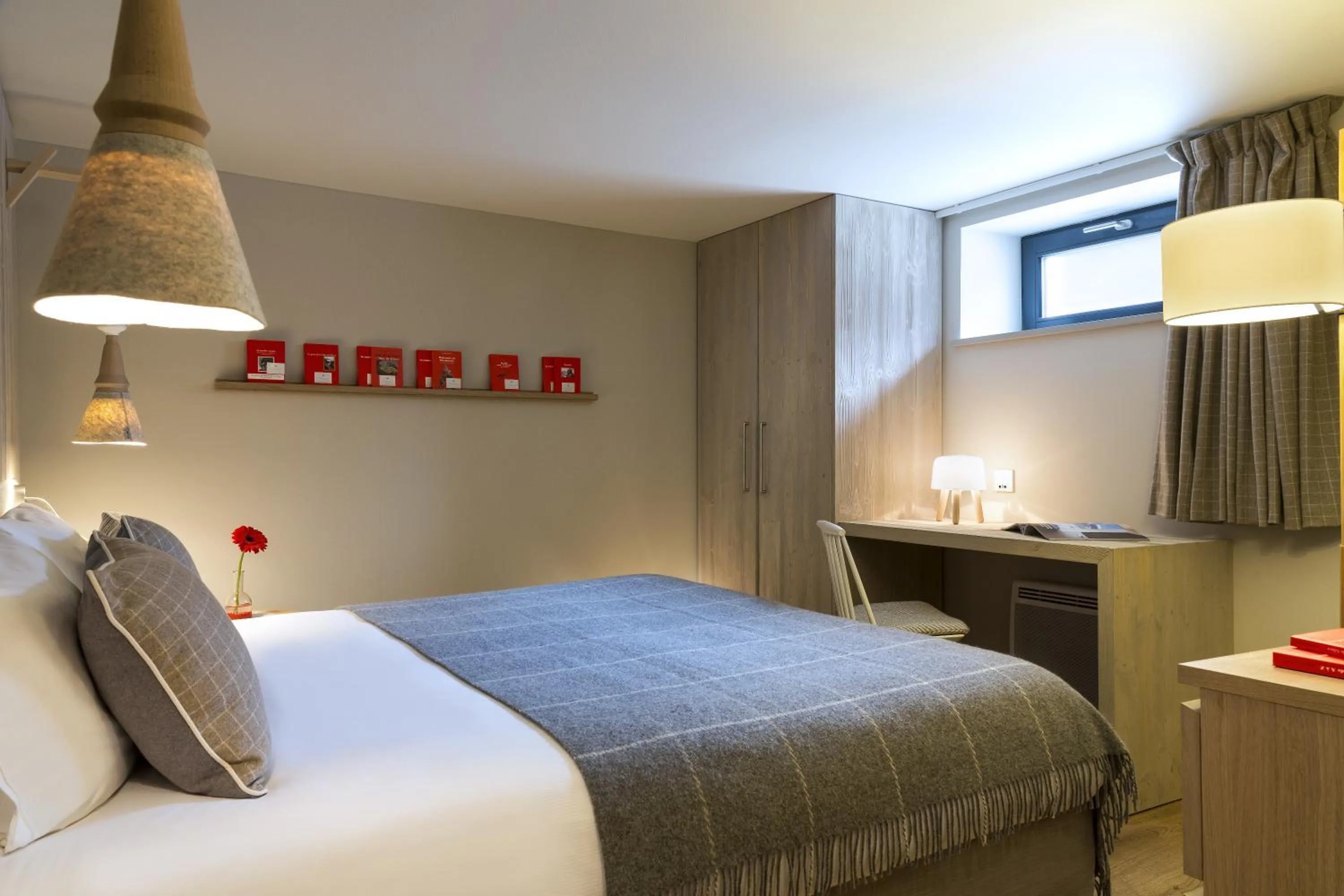 Bed in Appartements de l'Héliopic