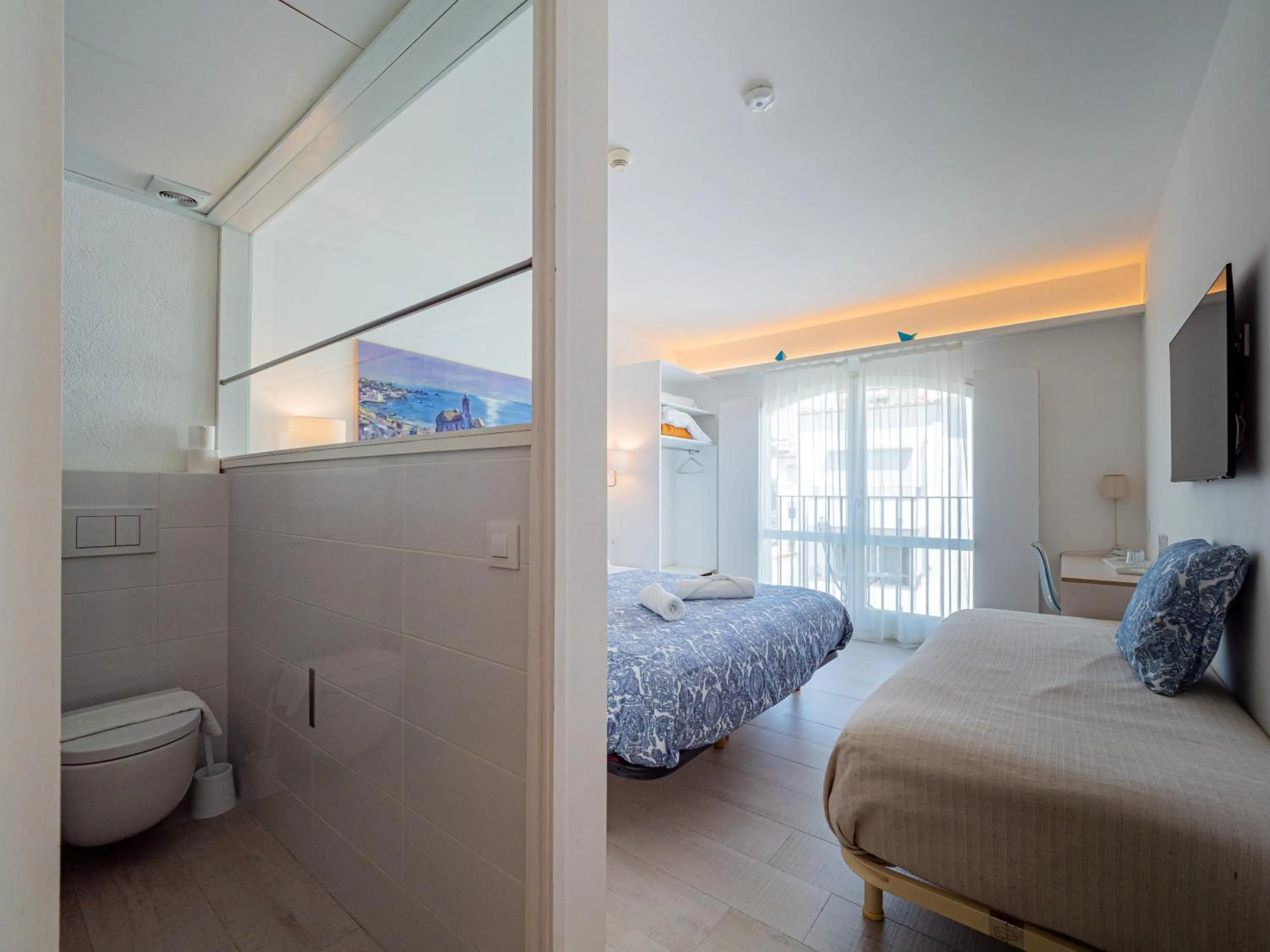 Toilet, Bed in Hostal Marina Cadaqués