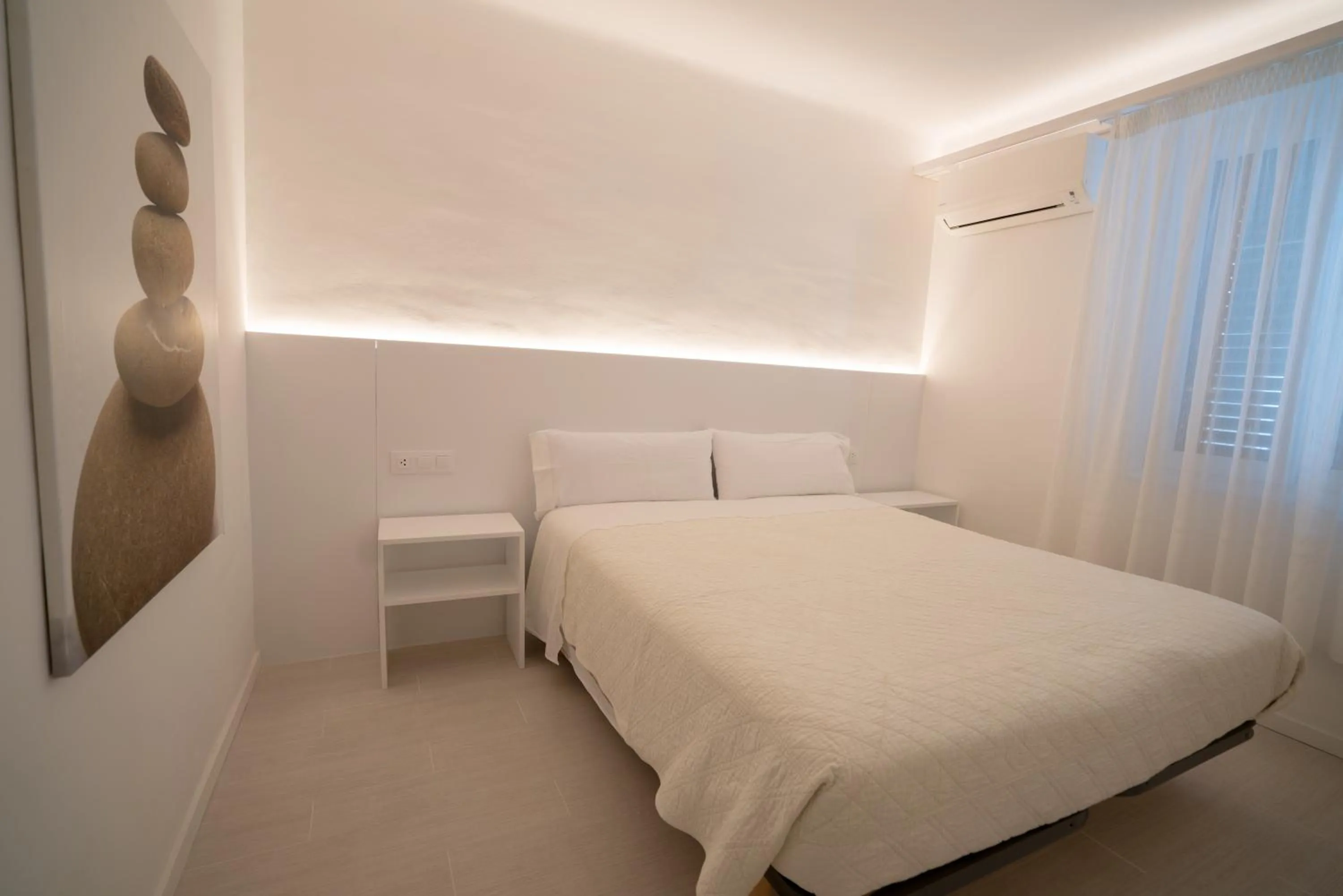 Photo of the whole room, Bed in Hostal Marina Cadaqués