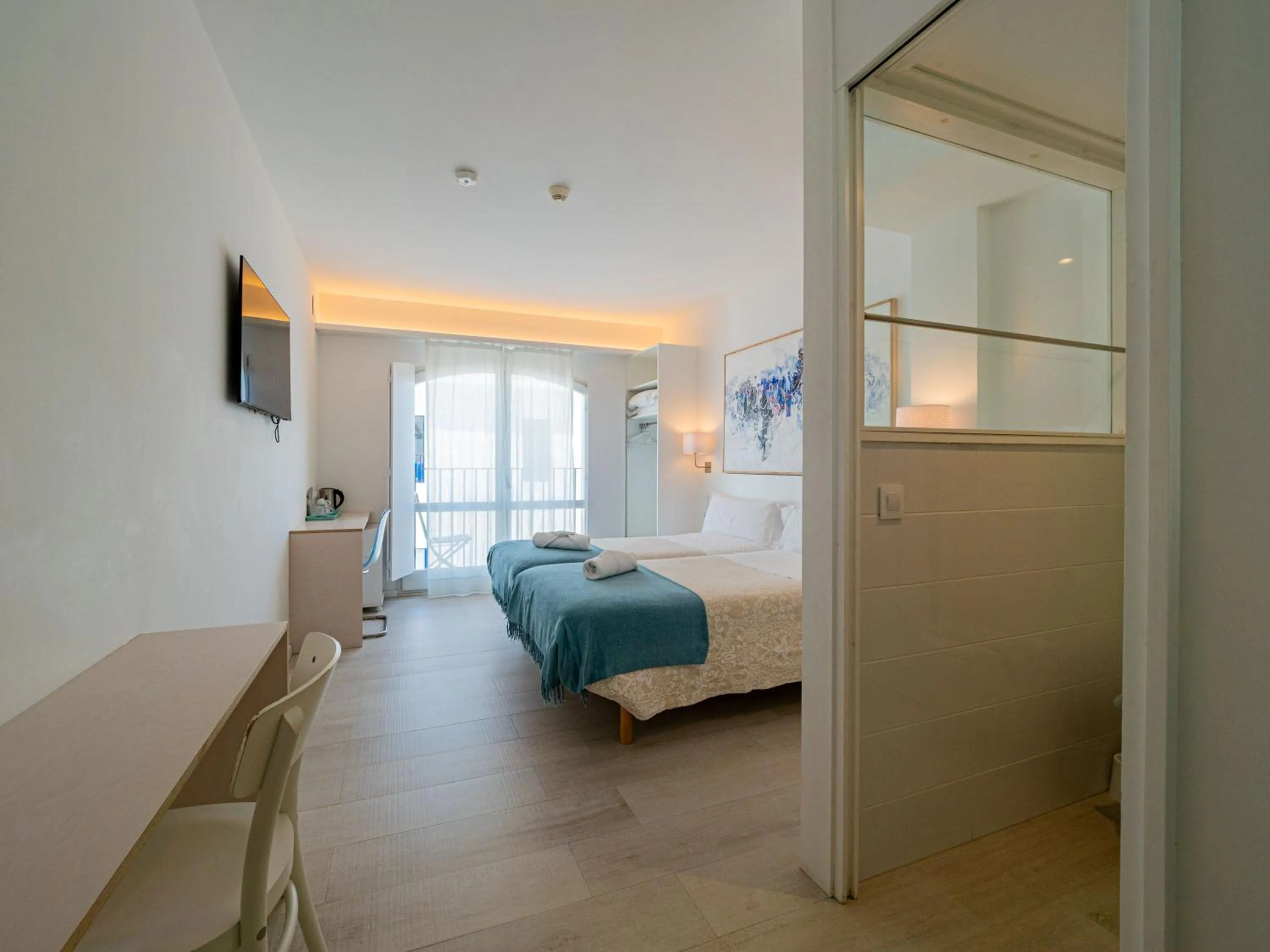 Photo of the whole room, Bed in Hostal Marina Cadaqués