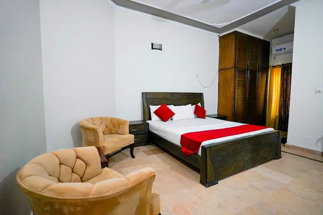 Bed in Capri Inn Guest House