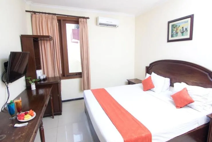 Bedroom, Bed in Tuwuh Hotel at Kayutangan