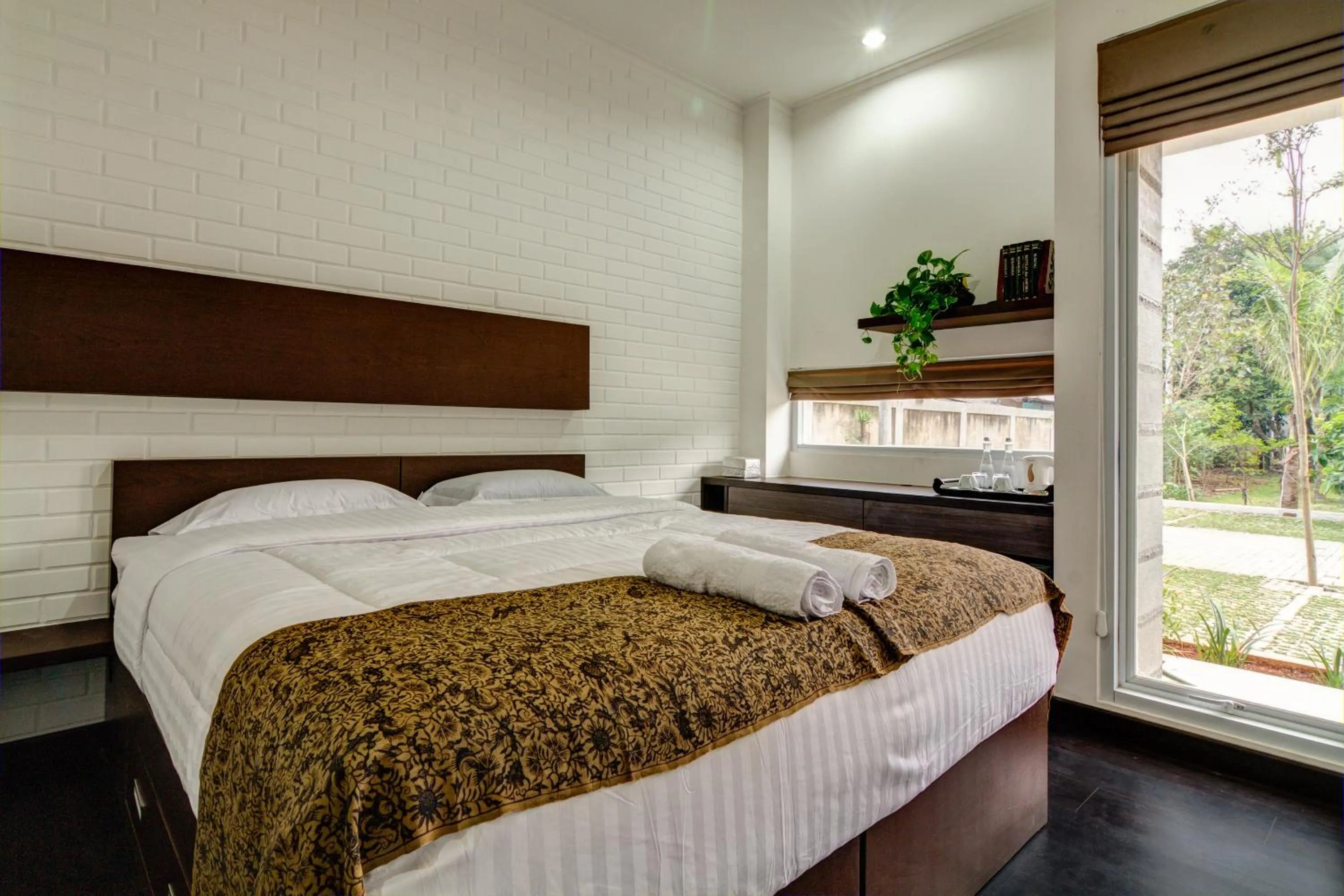 Photo of the whole room, Bed in Rumah Kamang Residence