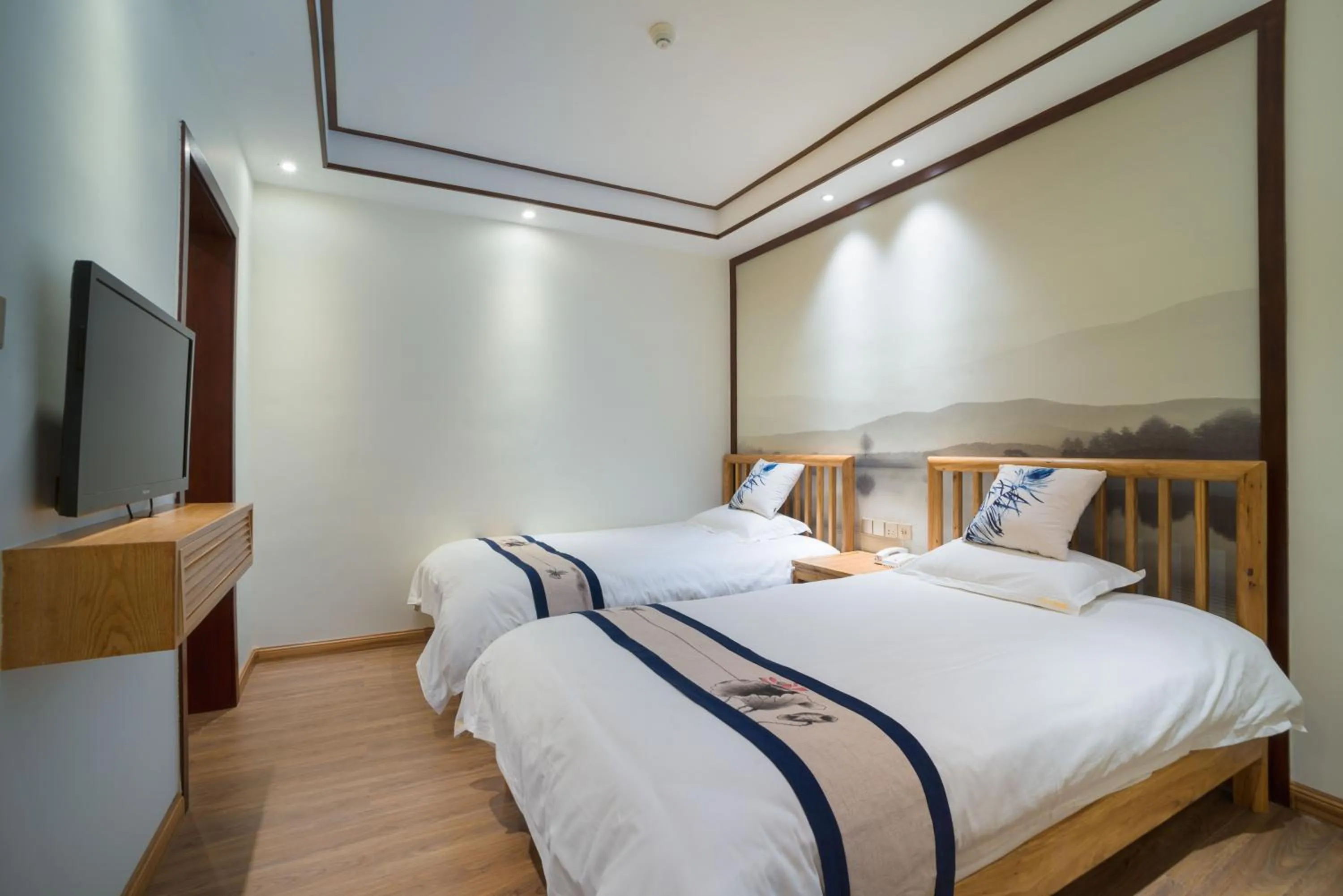 Bed in Riverside Inn Guilin Central
