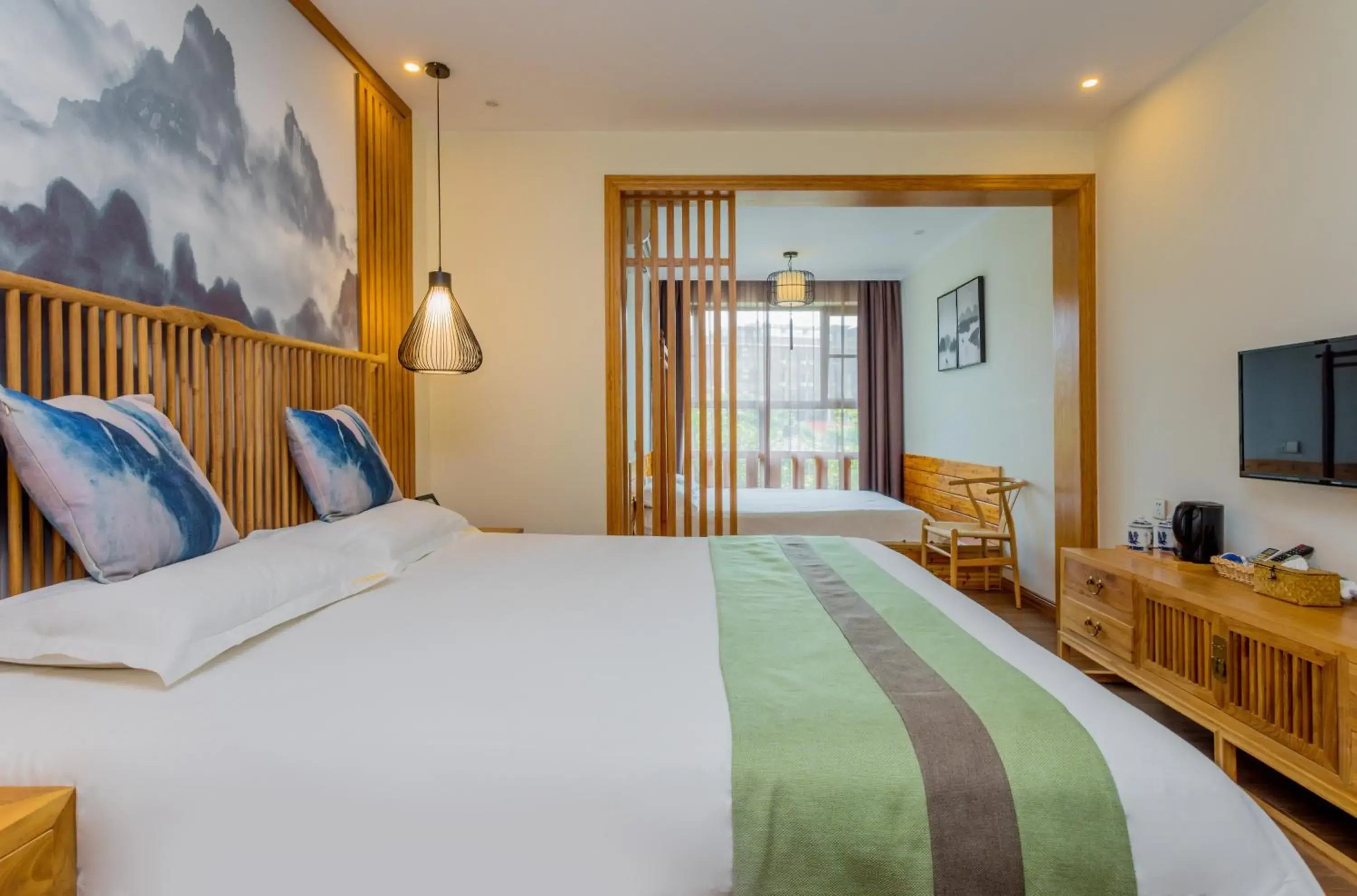 Photo of the whole room, Bed in Riverside Inn Guilin Central Photo of the whole room, Bed in Riverside Inn Guilin Central