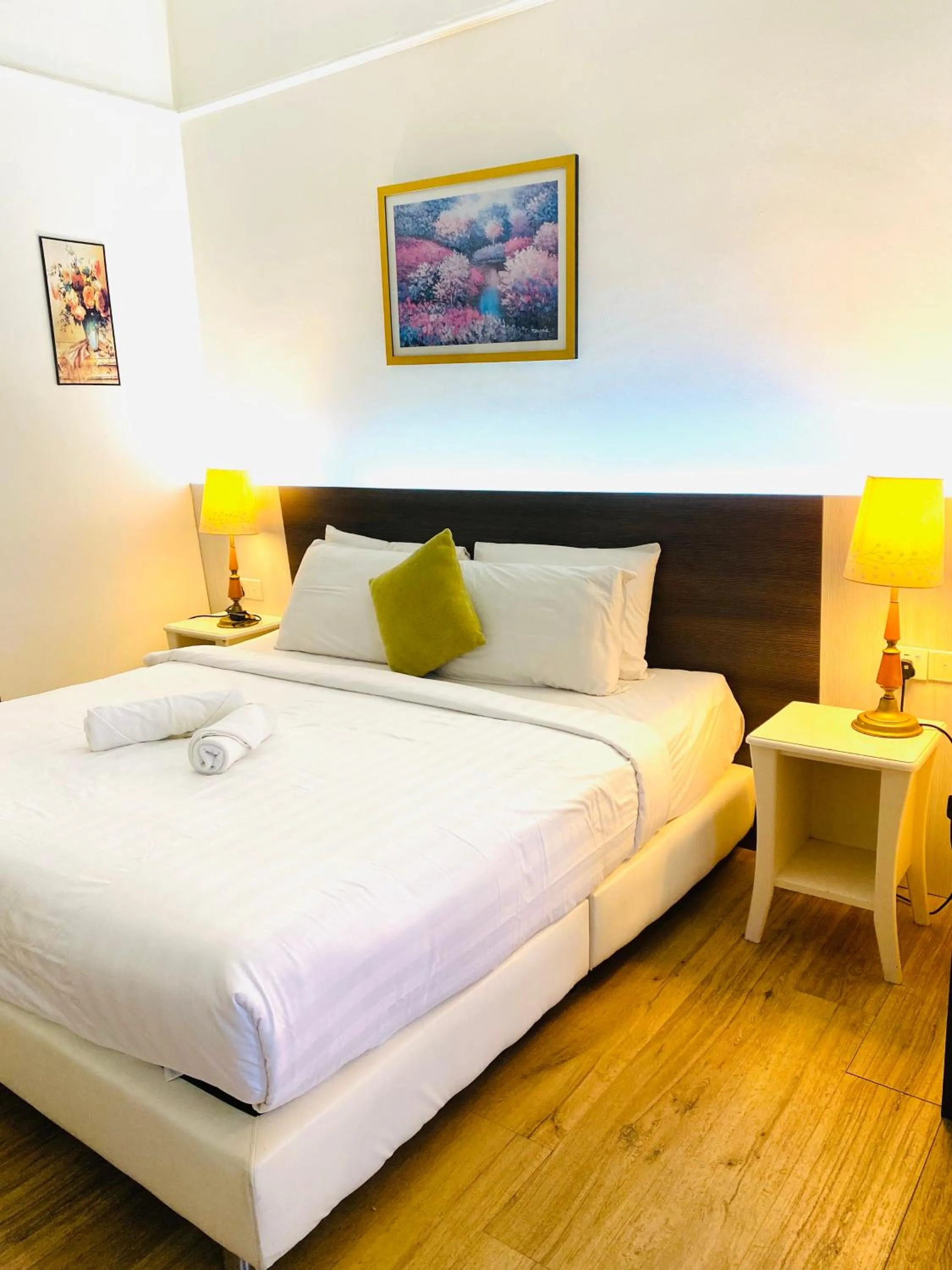 Seating area, Bed in Eastern Suites Times Square KL