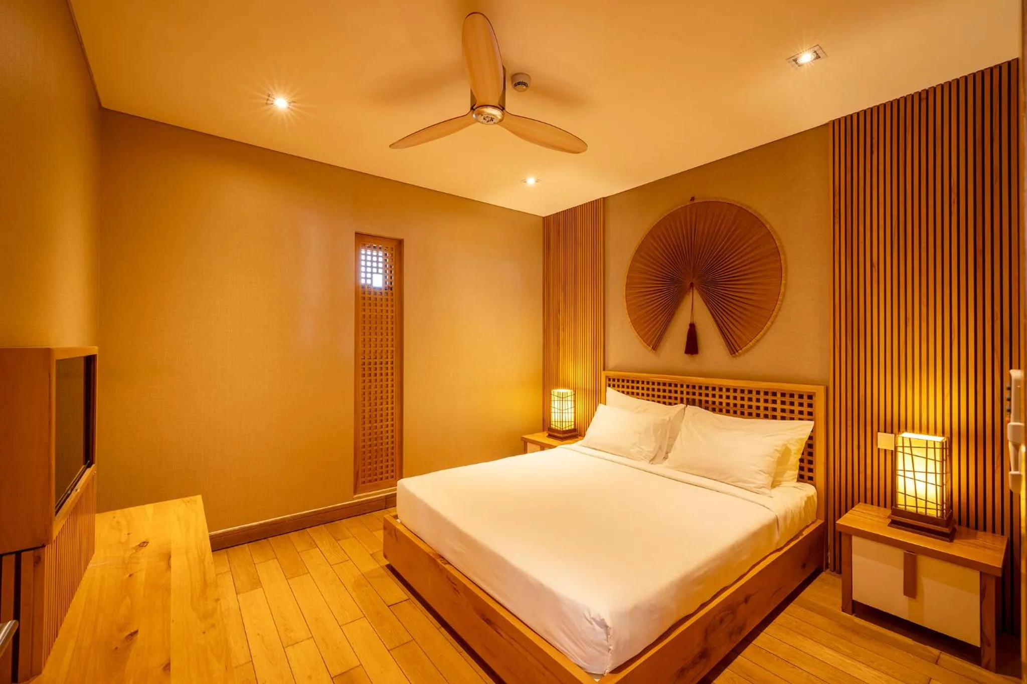 Bed in Maha Mangala Zen Garden & Residence