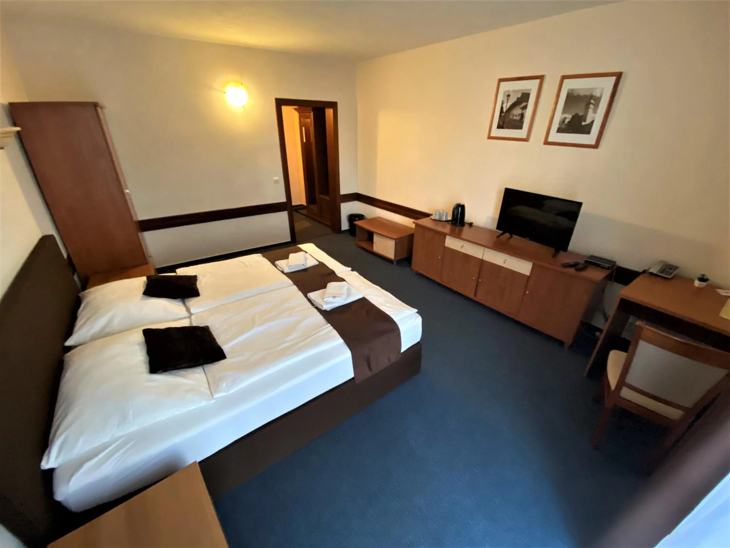 Bed in Garni Hotel Tatramonti